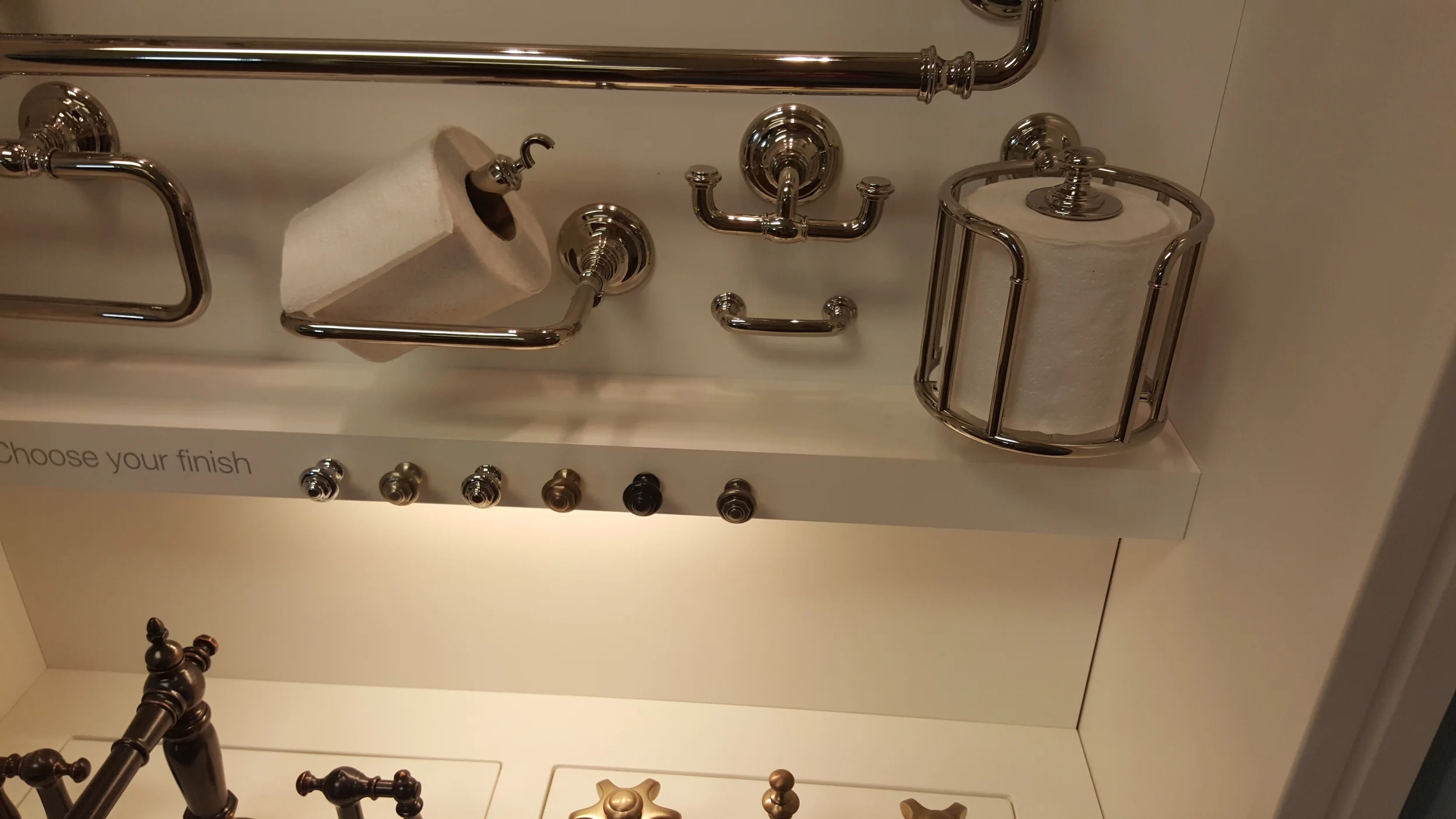 The horizontal tissue holder features a spring loaded roller for quick and easy changing of tissue!
