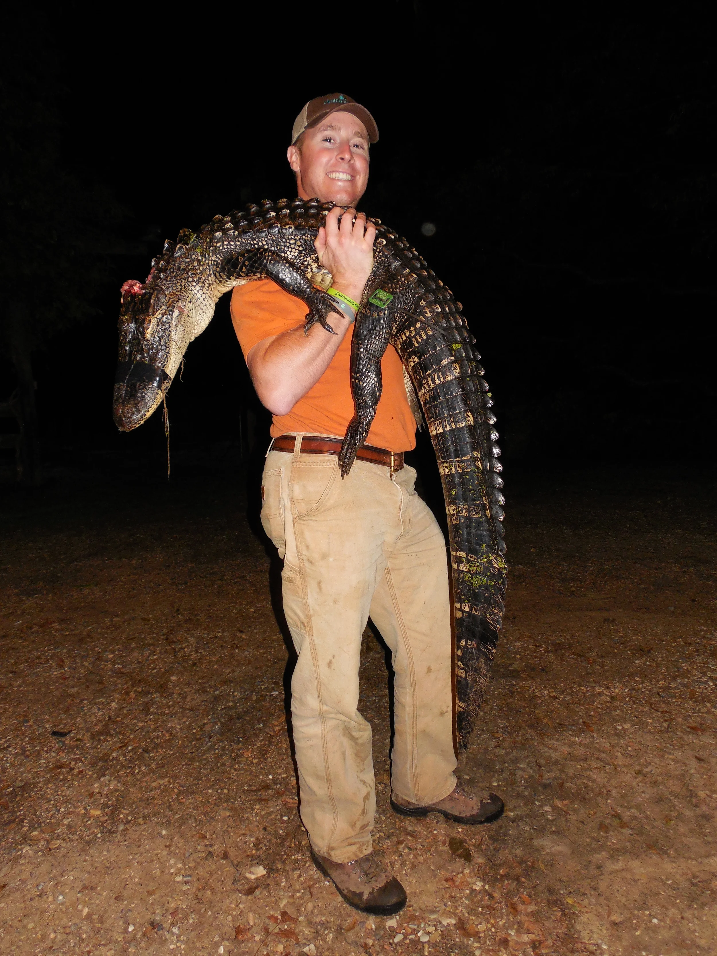 Adam Rutledge of Fayetteville with his 2013 season 6-foot 3-inch gator (killed while hunting with McClendon).