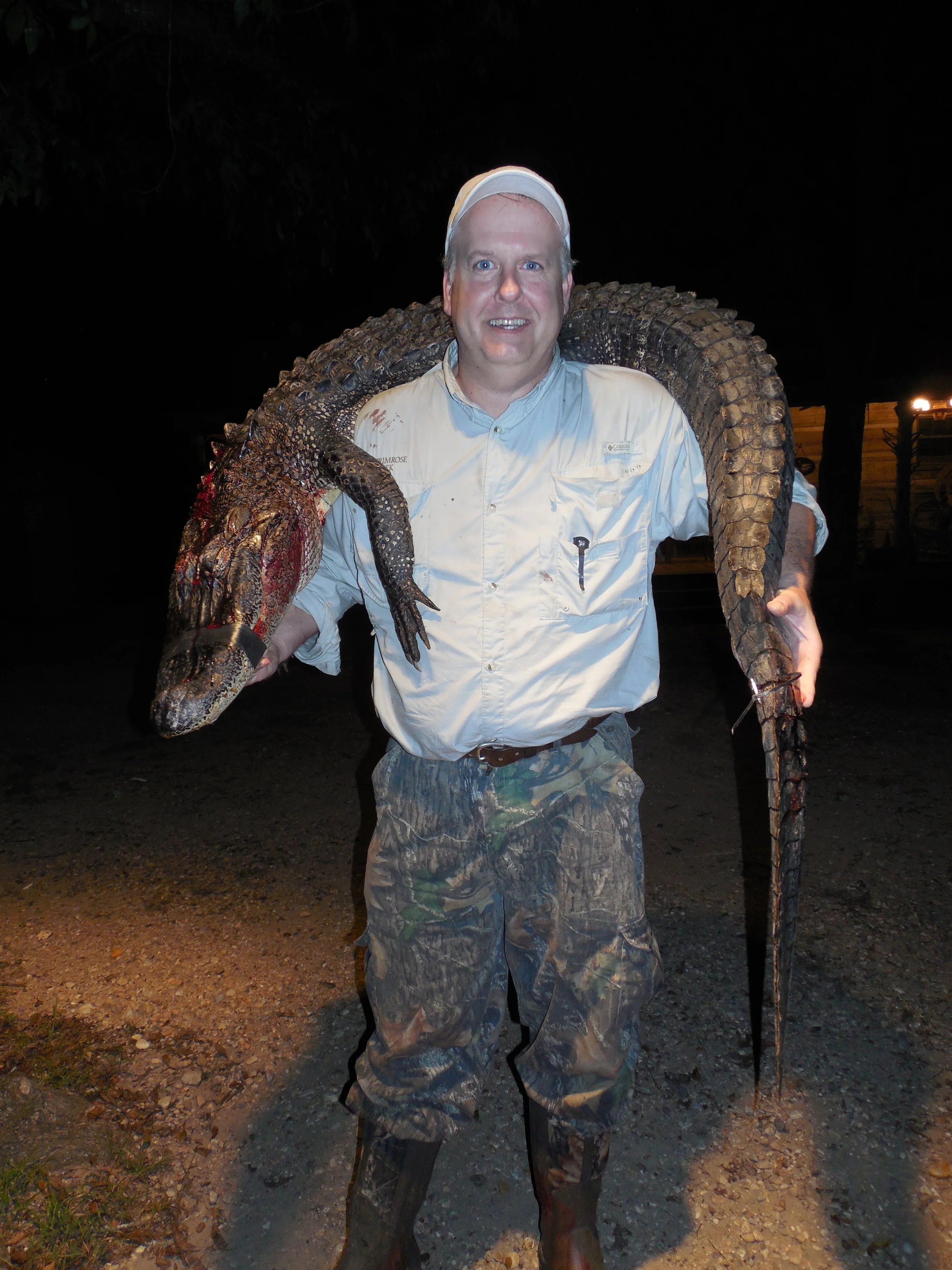 Mark Meadors of Little Rock with an 8’2” alligator taken (while hunting with the McClendon) in 2014.