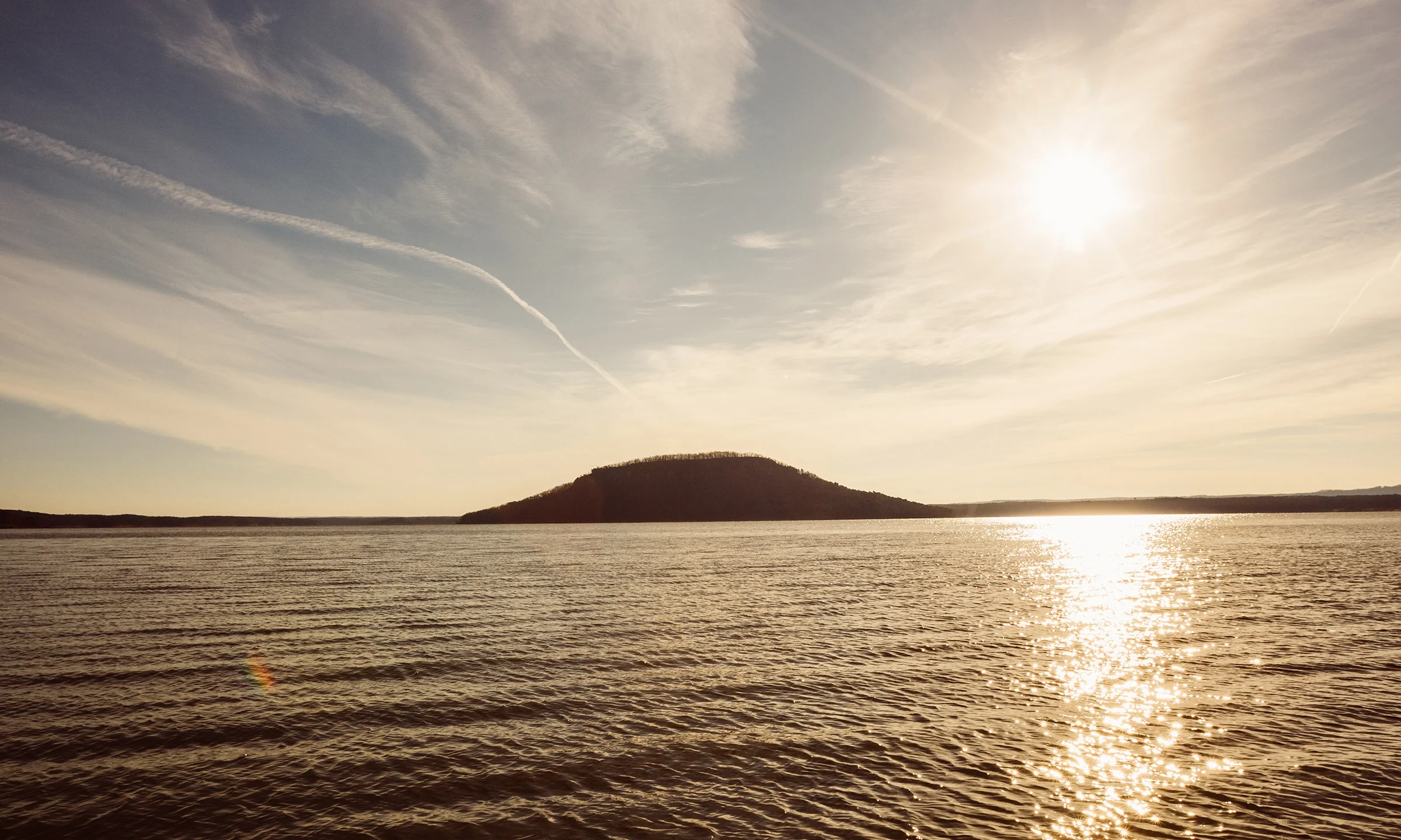 Majestic Sugar Loaf Mountain Island dominates the Greer's Ferry Lake horizon in Fairfield Bay.