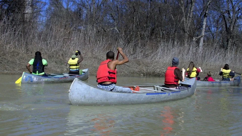 Volunteers participate in the Friends of the Sunflower annual cleanup on the Mississippi River.
