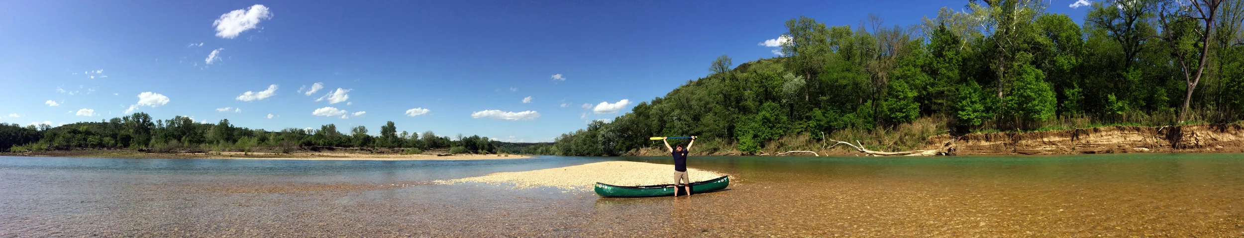 Nate Jordon takes a triumphant break on a Buffalo River gravel bar during his attempt to float the entire river.