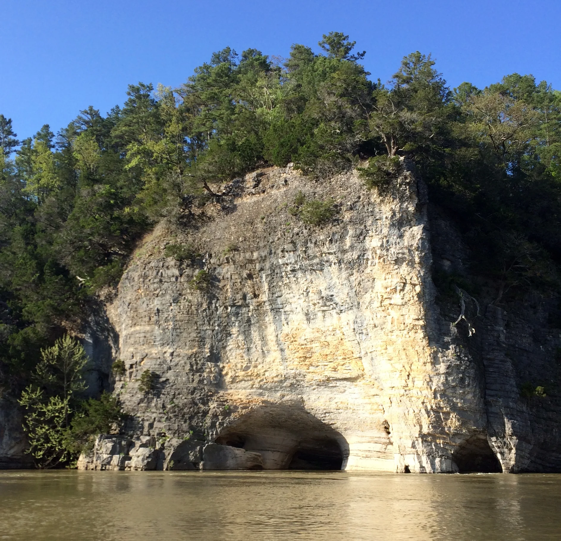 Sometimes, the best perspective on a limestone cave is captured on the rippling water.