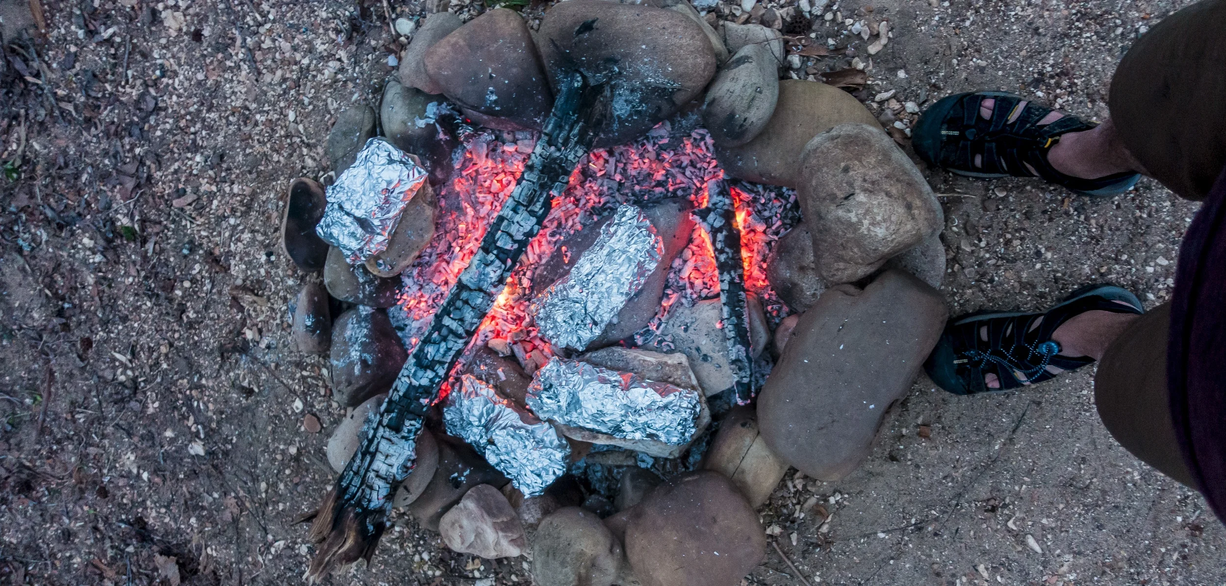 At the end of a day of hiking, making a hobo meal is as easy as building a fire and combining ingredients. Photo by Dustin Jones