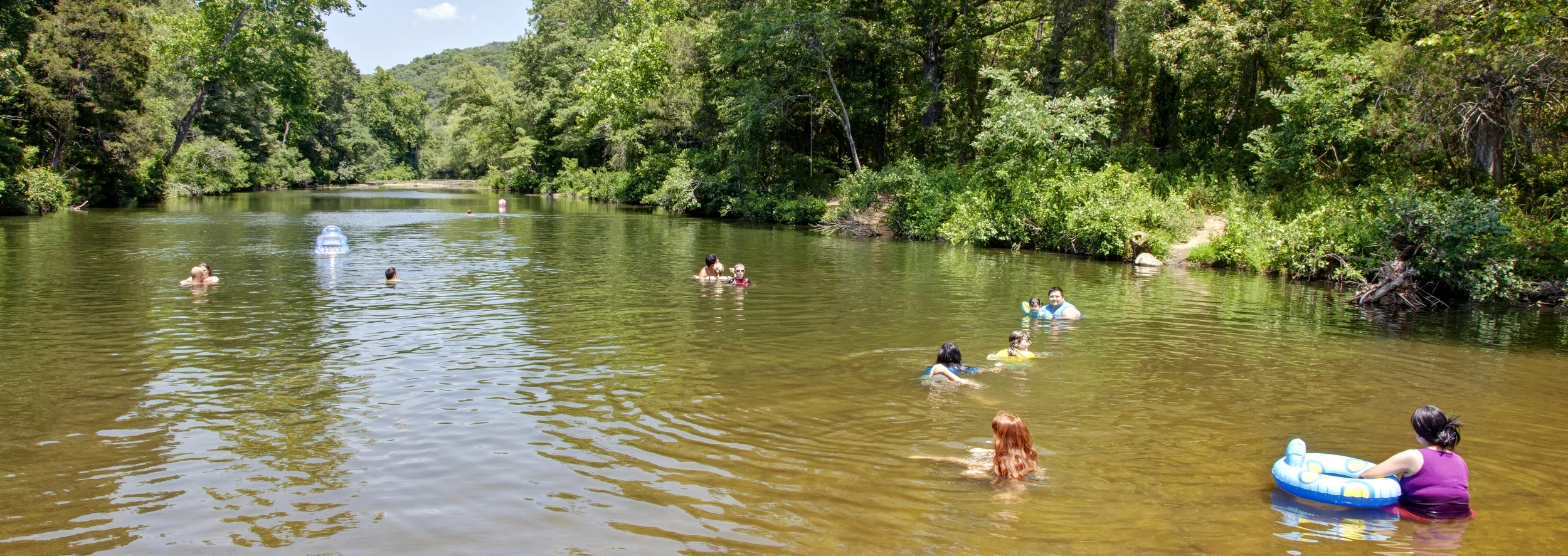 Summertime means swimming time in Arkansas, and Natural Dam is just one of the hot spots that will get you cool.