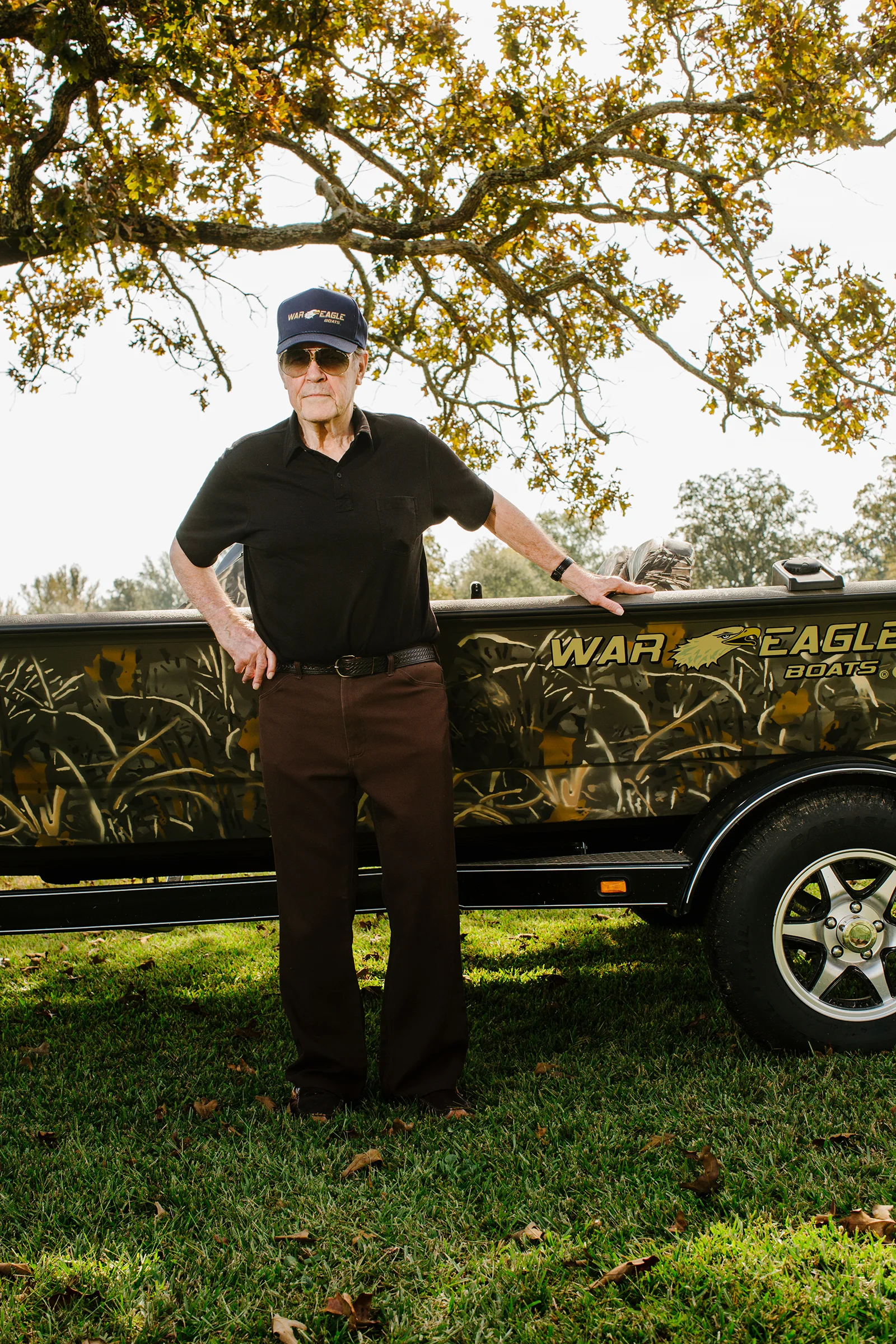 Kim Ward poses with one of the War Eagle boats that bear the mark of his innovations in the aluminum boat industry.