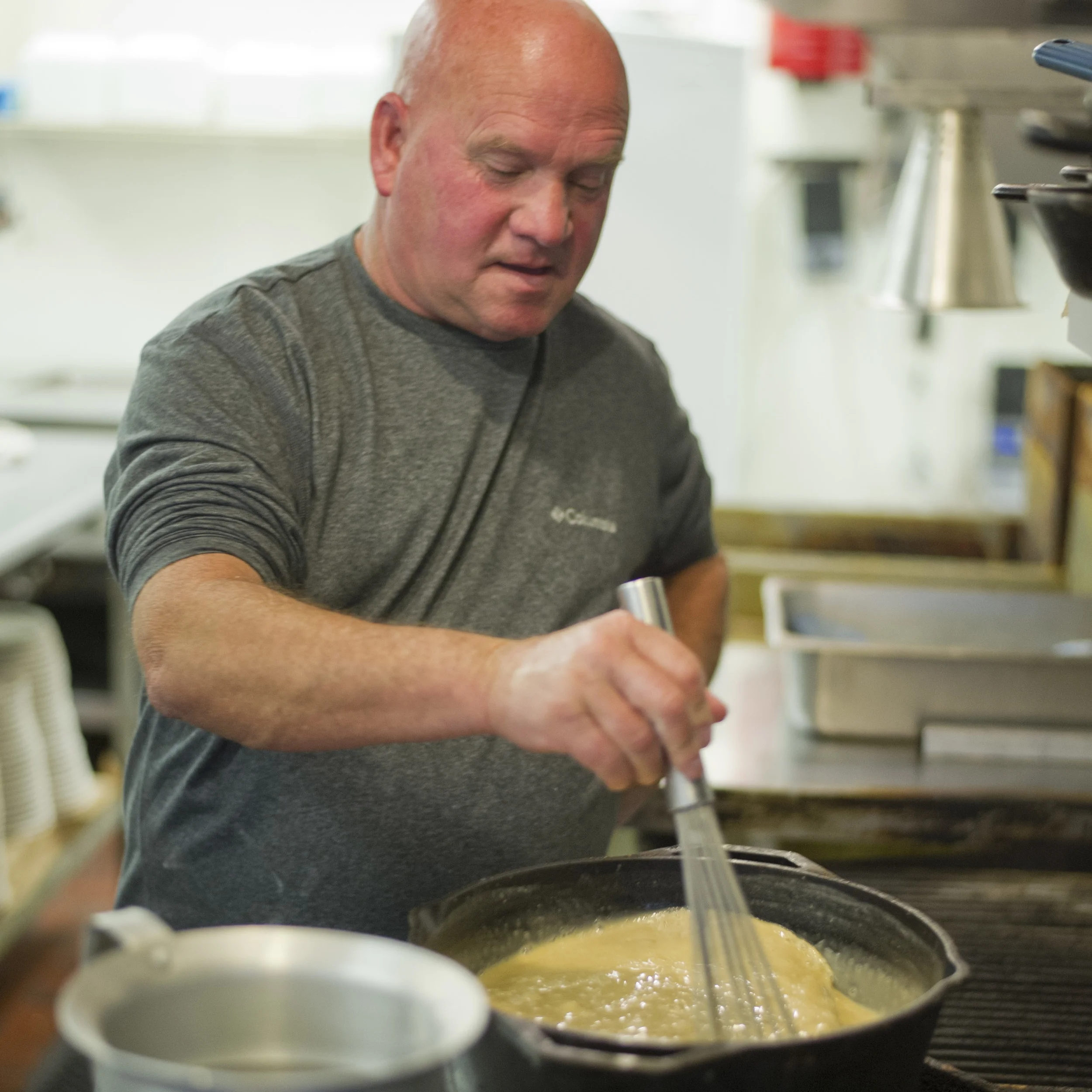 Homer Campbell prepares a pot of gumbo
