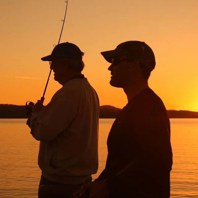 Fishing expert Mark Hedrick (left) and his son Matt go after crappie on Lake Maumelle.