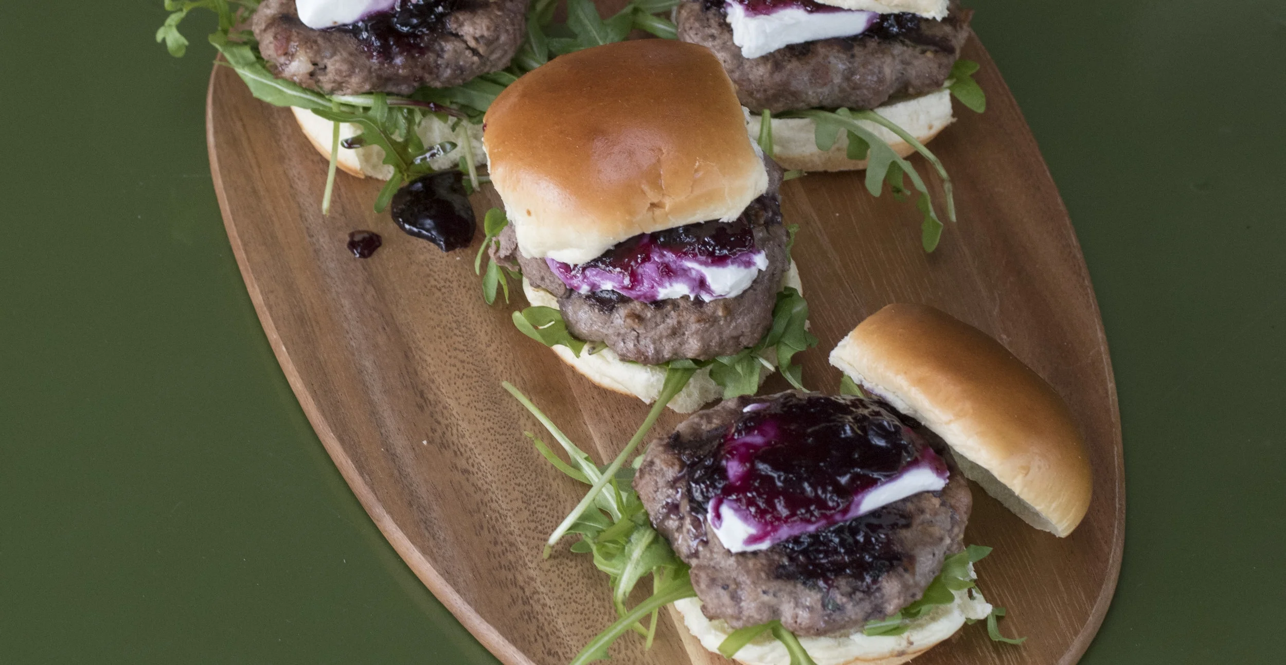 Fresh blueberries and arugula balance the venison.