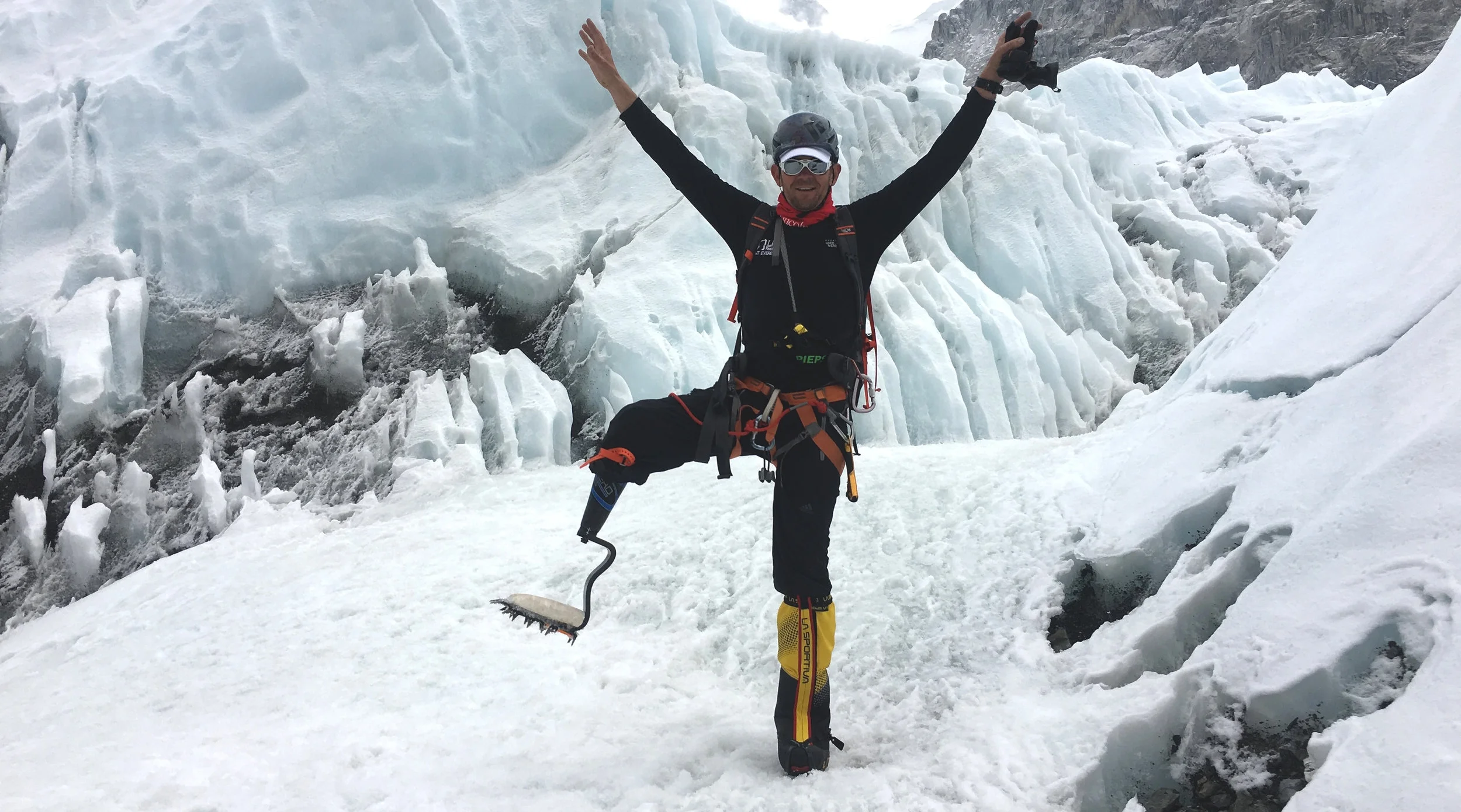 Jeff Glasbrenner shows off his custom-designed carbon-fiber prosthetic leg among the treacherous ice floes of Mount Everest.