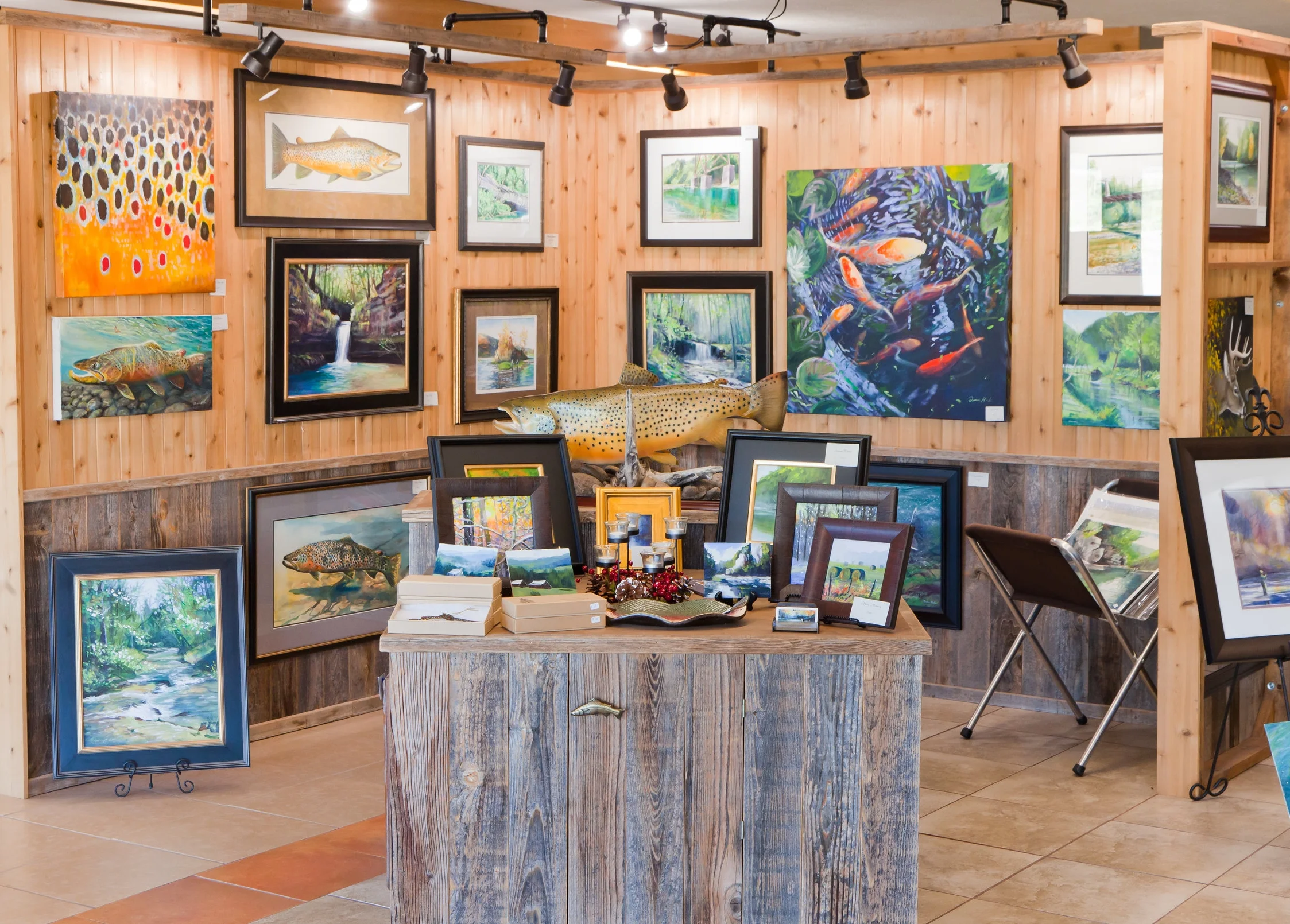 The gallery is filled with outdoor-themed art that ranges from paintings to carvings to chairs. Rivertown Gallery is located at 3512 US-62 in Mountain Home.