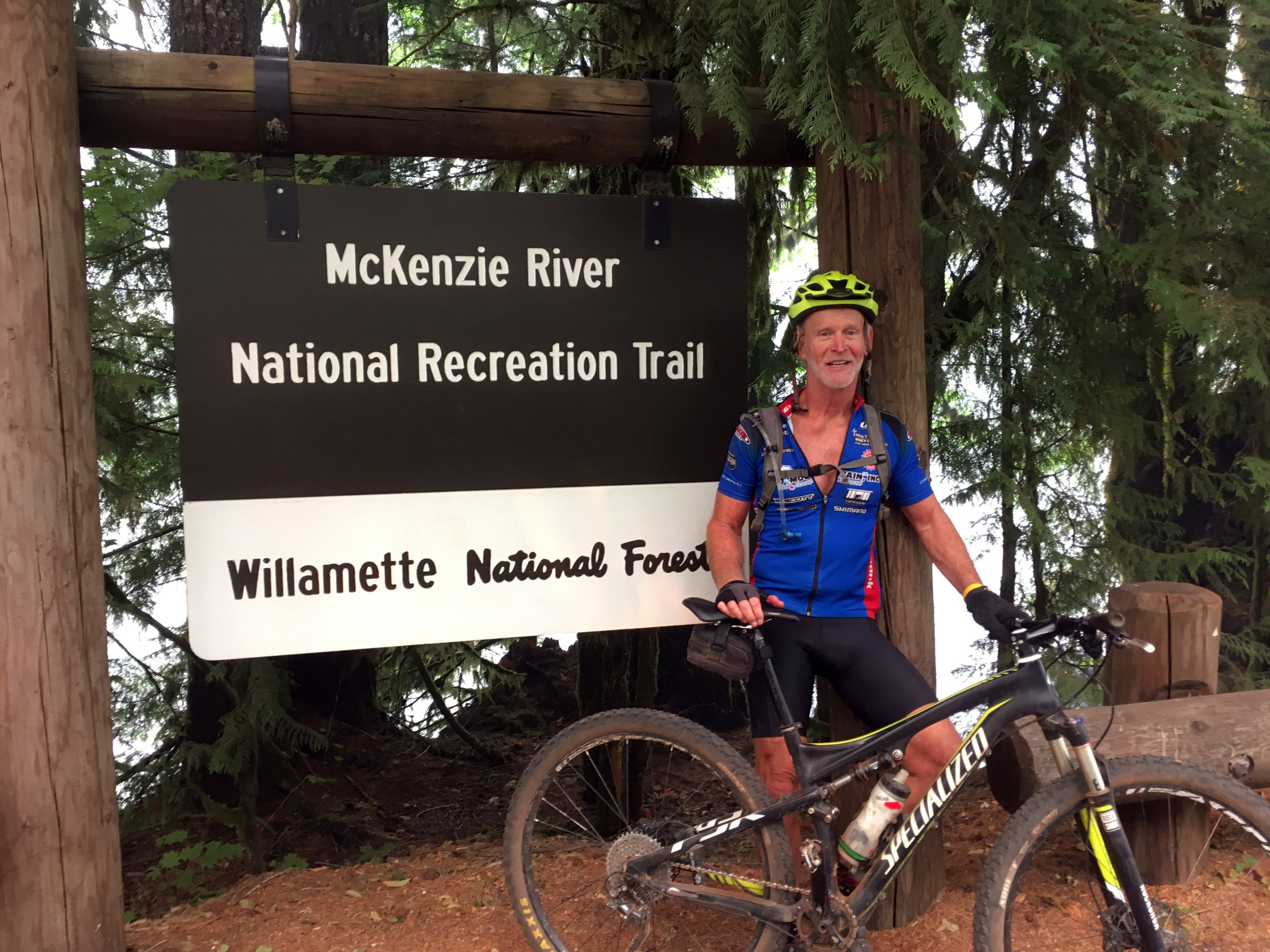  Top to bottom: Sweet rolling single track bordered by giant conifers. Bob with satisfied smile at finish of his McKenzie River Trail Adventure. 