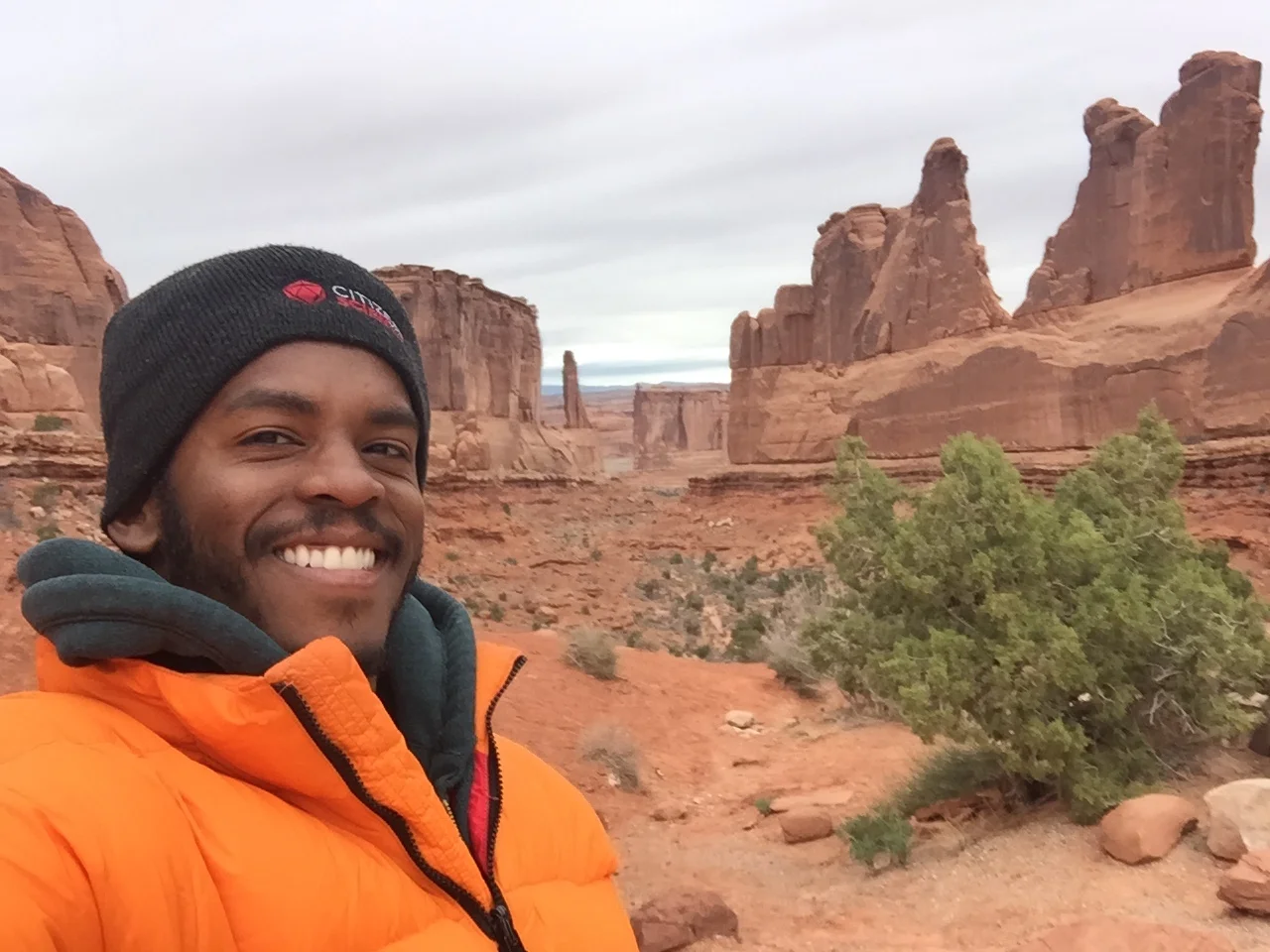 On a pit stop at Arches National Park, Dr. Sconiers takes a moment to say, “Cheese!”