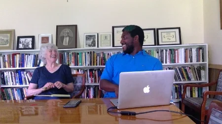 Solomon and attendee laugh smaller.jpg