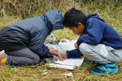 Sameer and a kid work.jpg