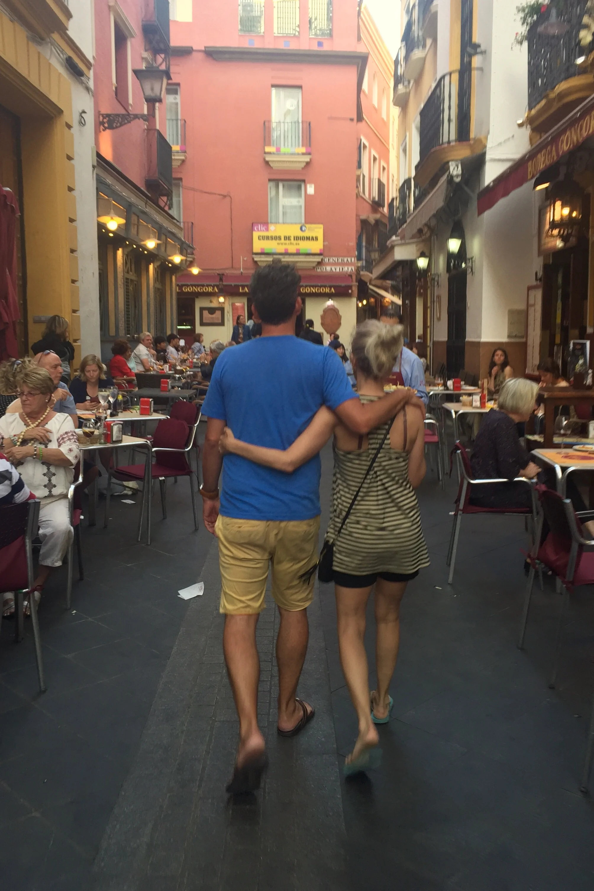 Cute couple heading to tapas alley