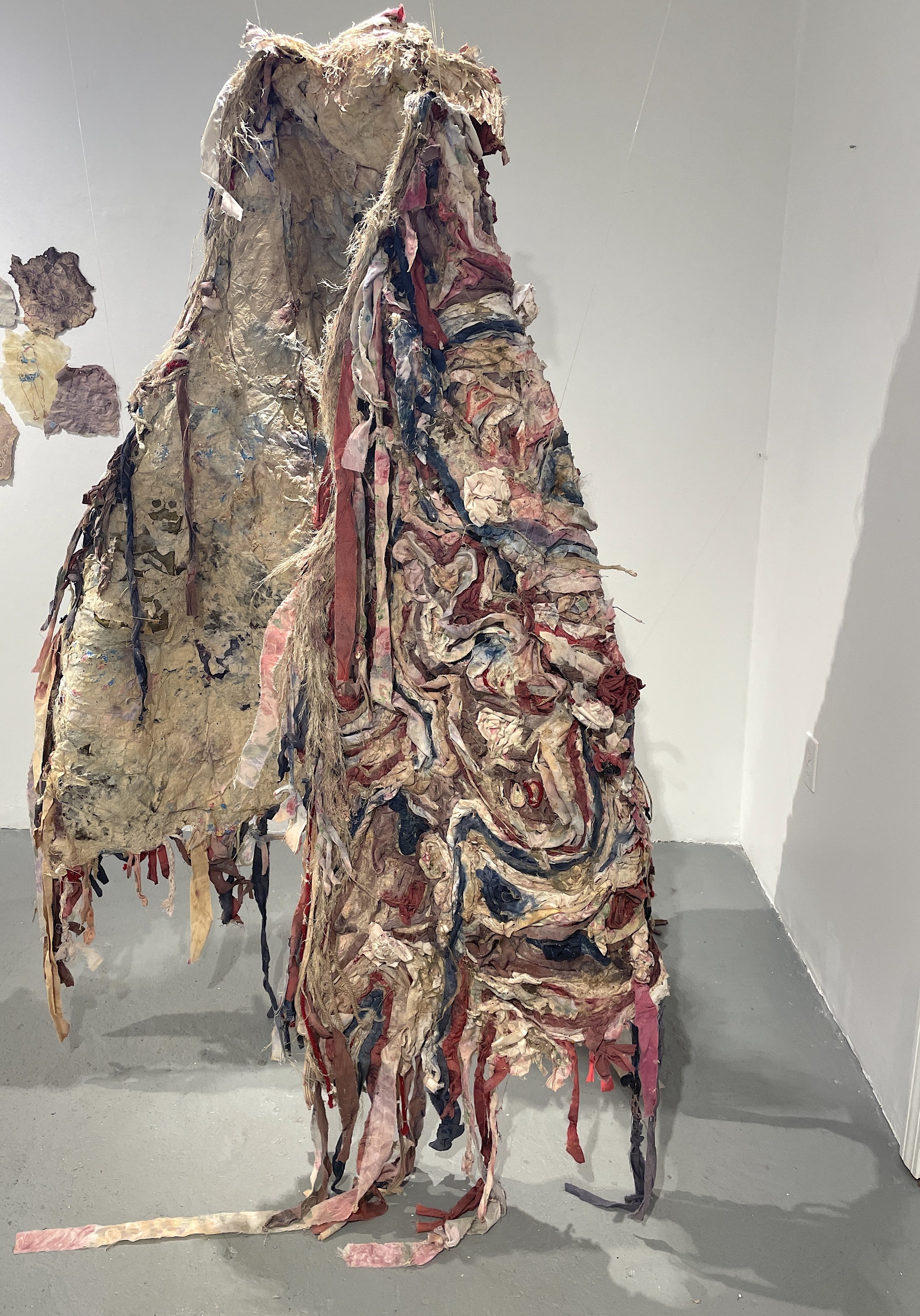  Sonja Czekalski   Beldam Cloak   2021&nbsp;  My grandmother's fabrics, my old bed sheets, yarn, embroidery floss, flax paper pulp, natural dyes, RIT dye, red wine, seaweed, assorted plants, pennyroyal herbs, human hair, and adhesive on handmade gamp