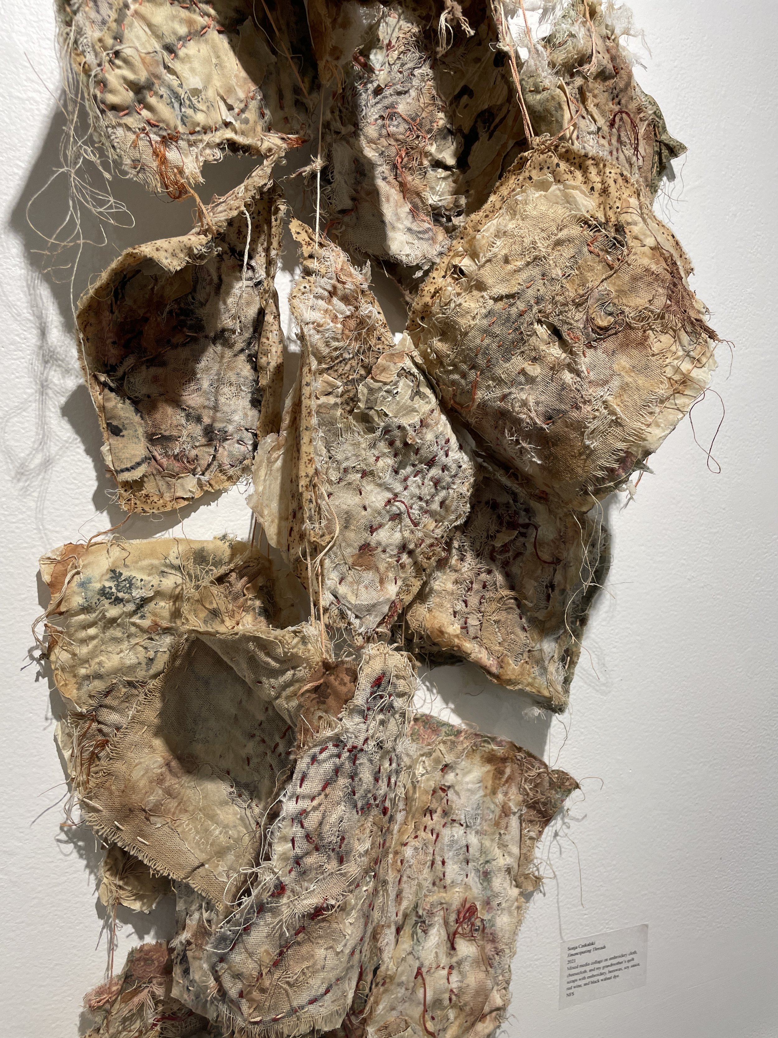  Sonja Czekalski   Emancipating Threads   2021  Mixed media collage on embroidery cloth, cheesecloth, and my grandmother’s quilt scraps with embroidery, beeswax, soy sauce, red wine, and black walnut dye. 