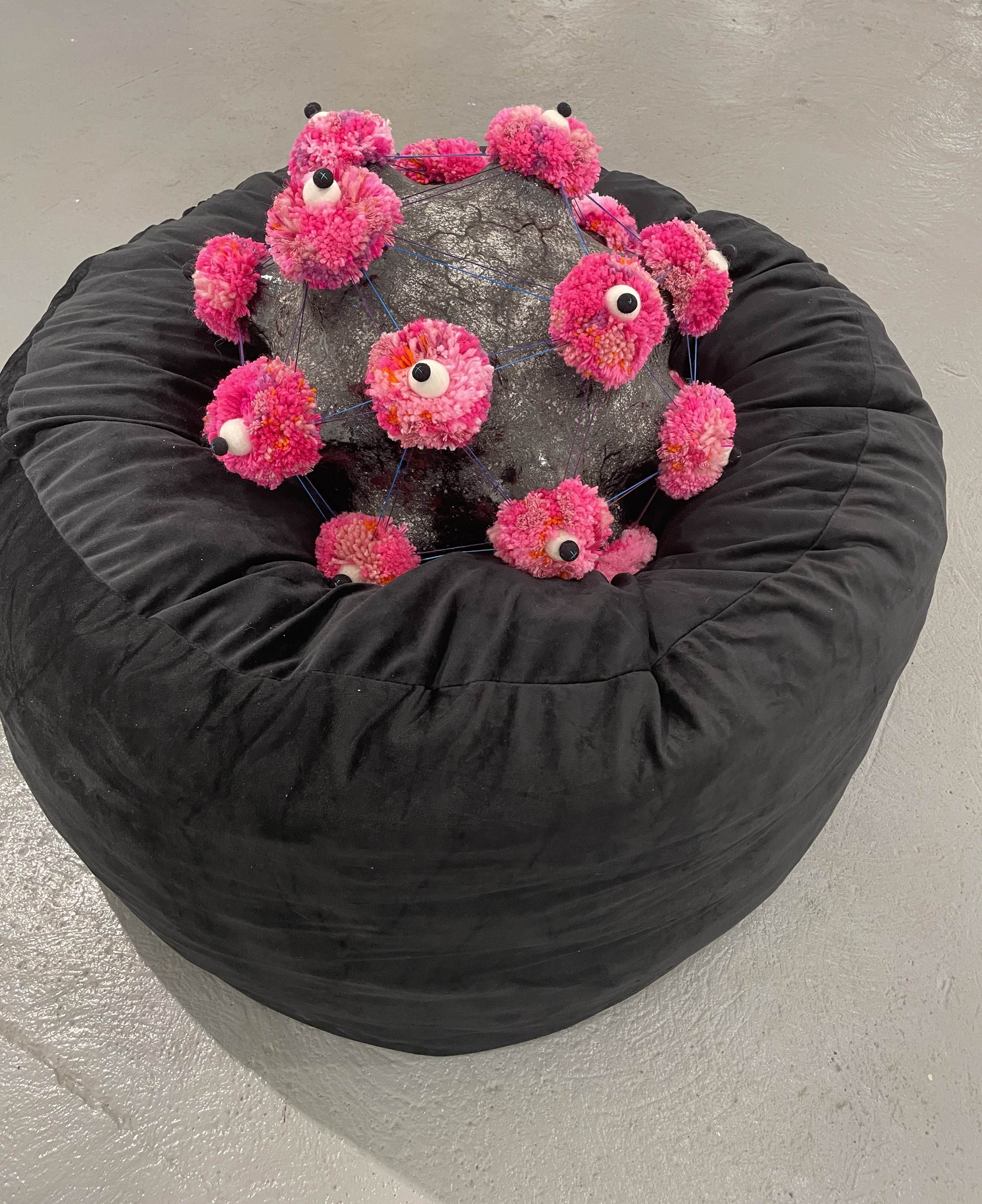  Getting Comfy  Susan Mead Matthews  Ceramic and fiber  2022  $2000     I started working on this piece in the spring of 2019.&nbsp; A year before I, and everyone else on the planet, knew what a coronavirus looked like.&nbsp; Now, 4 years later, I am