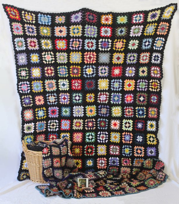  Lauren Comerato, MA   Carmella's Afghan   Crocheted yarns, polaroid, basket  NFS  2020  &nbsp;  Inspired by my great grandmother Carmella's afghan, I wanted to use the same process she used over 60 years ago and crochet a blanket as if we were toget