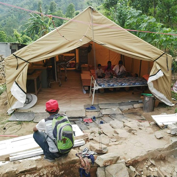 Tent with family in after Nepal earthquake. Tsering's Fund help with emergency relief after a major earthquake in Nepal