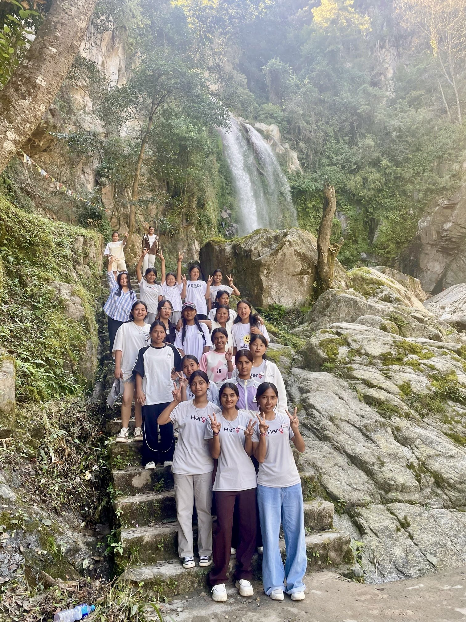 Hero Camp 2025 students hike to waterfall