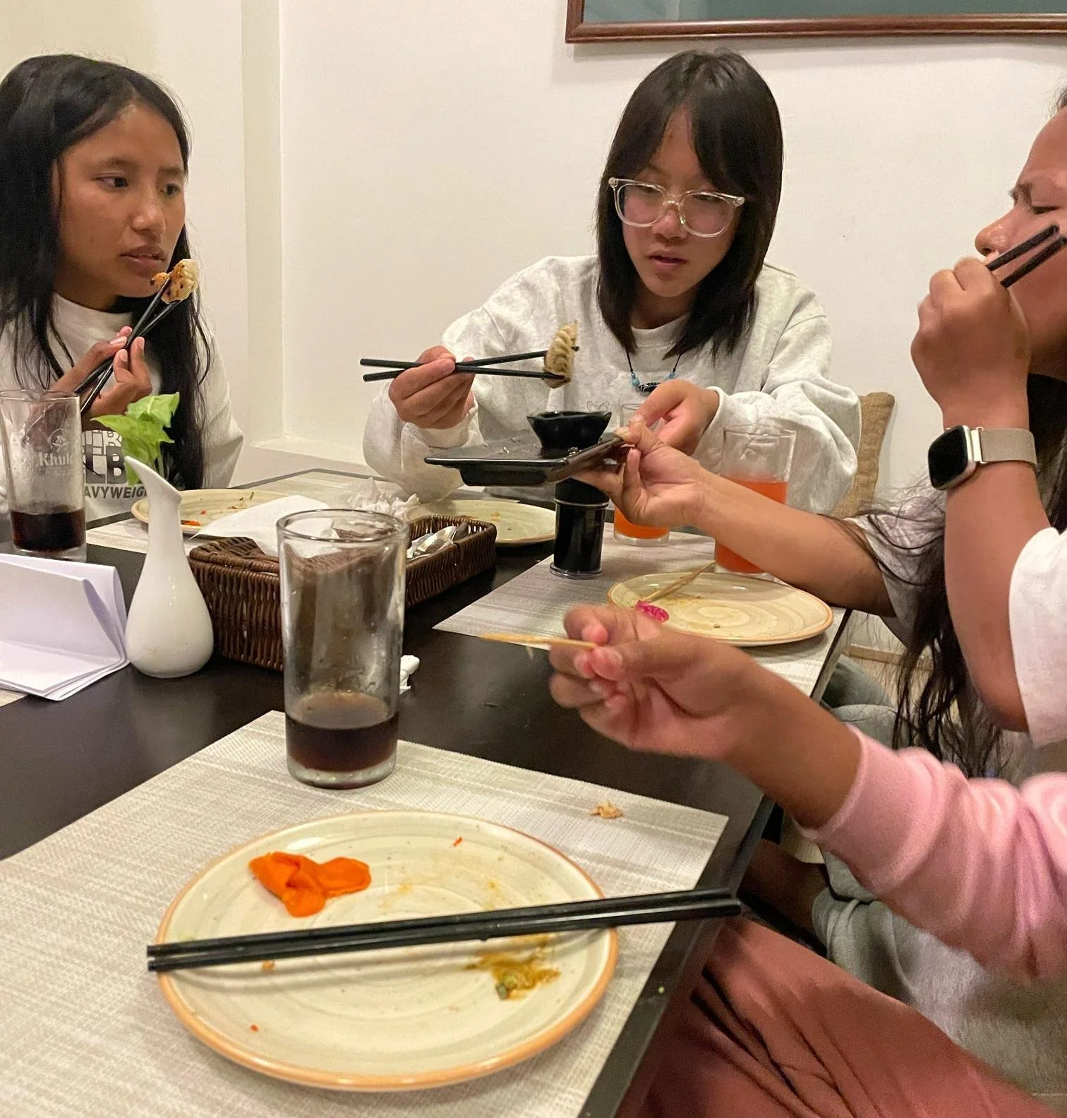 Students trying Japanese food for the first time 