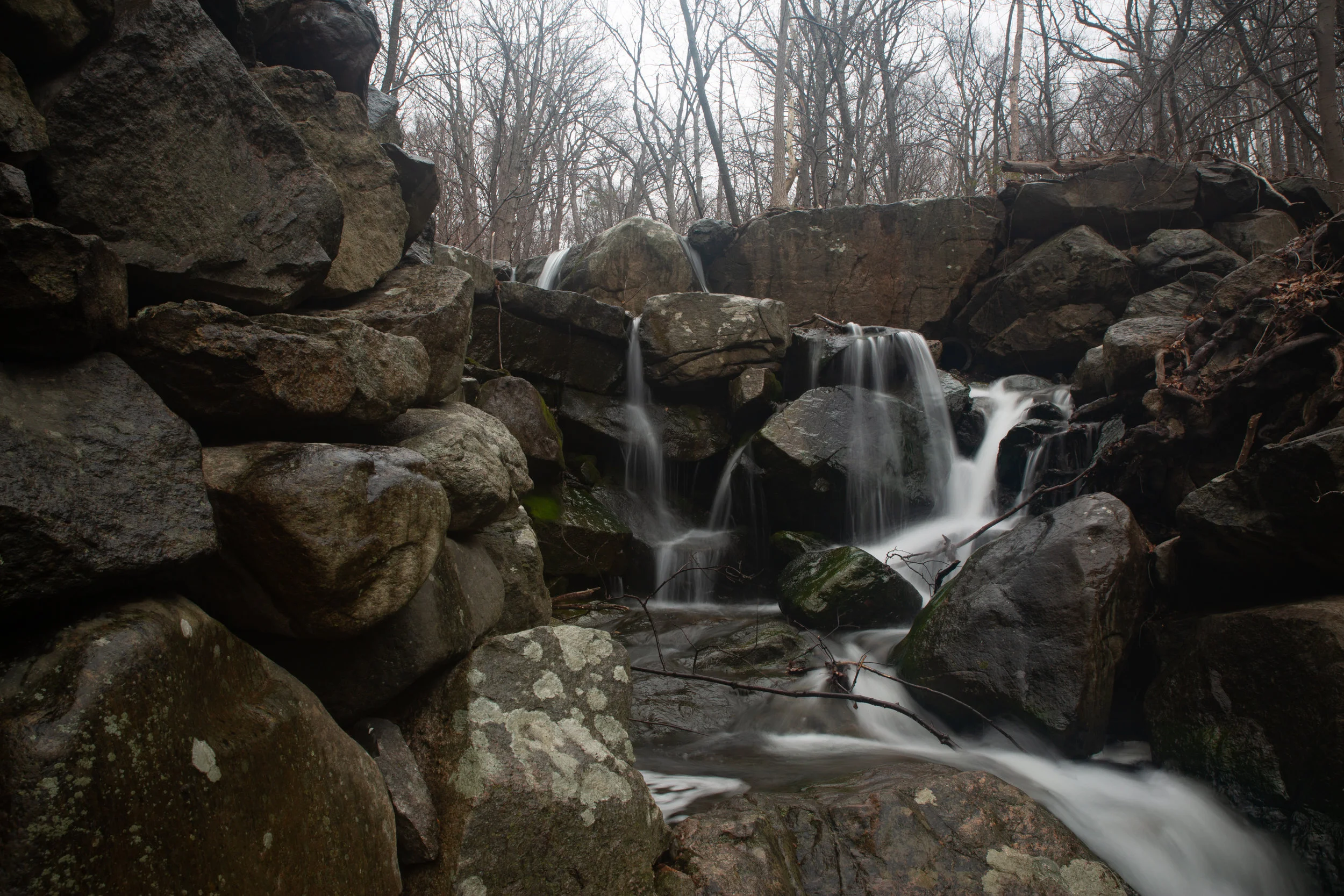 Rock waterfall Model could stand on rock ledge at bottom image. Camera would pull closer to ledge