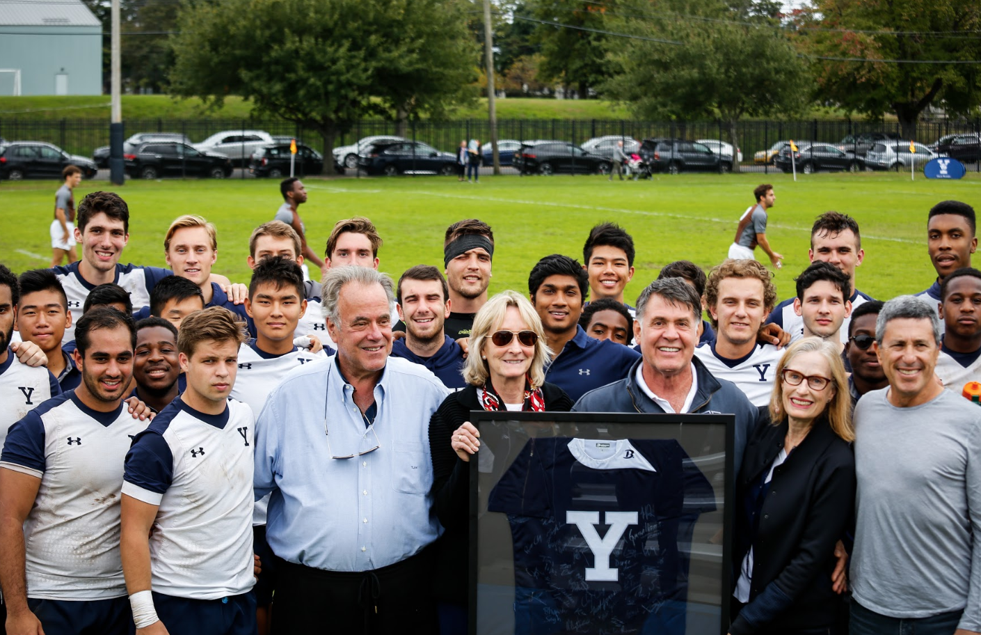1942 Yale Rugby Captain, Henry P Wheelers family pictured with the Yale Rugby Squad