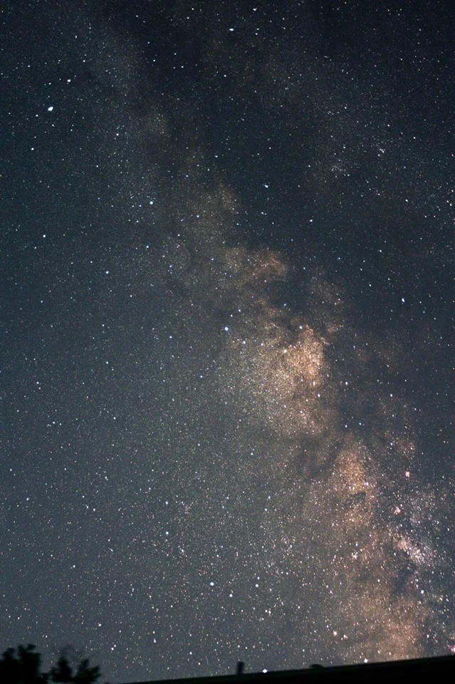 The Milky Way over a local roof line (photo by Tim Connolly)