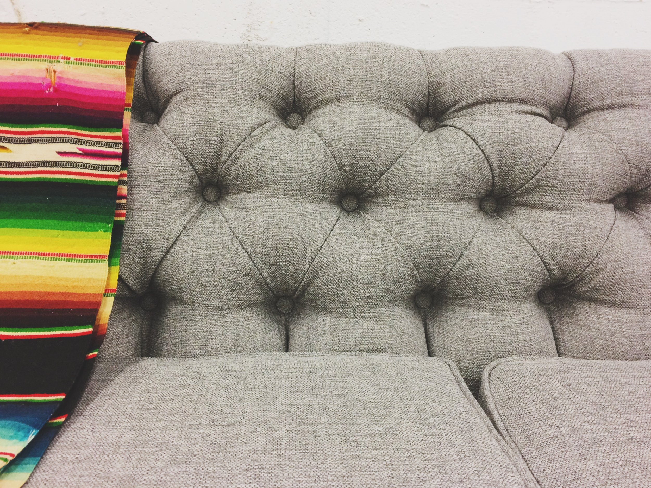 Before &amp; After: Vintage Tufted Sofa Goes from Skirted to Stunning