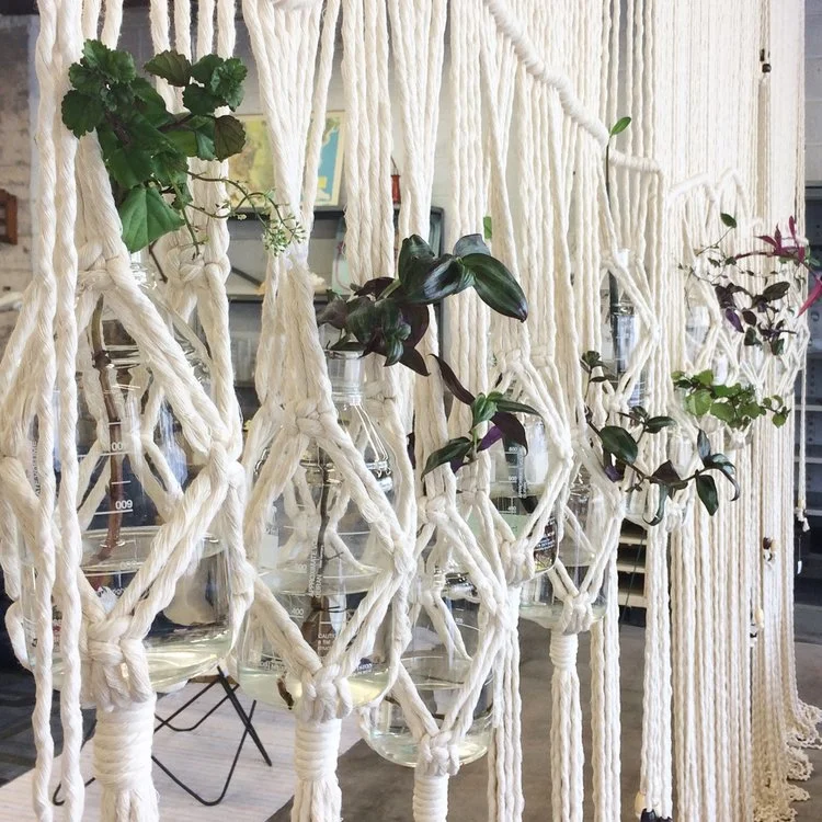 Our giant macrame wall of plant goodness by House Sparrow Fine Nesting!