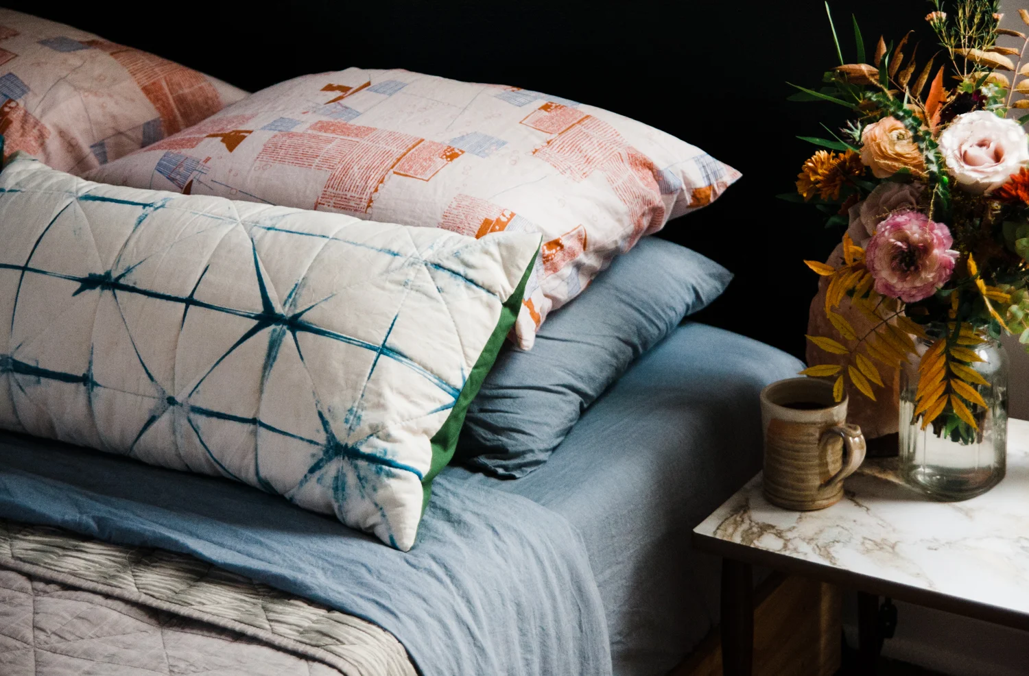 Much like making fire, creating your own warm, comforting and useful bedding is empowering. It also leaves you feeling your place in a long line of makers throughout history. It's a satisfying tradition to be a part of. That Carolyn Friedlander fabric is SO lovely. I marvel at the way it is geometric and organic all at once.