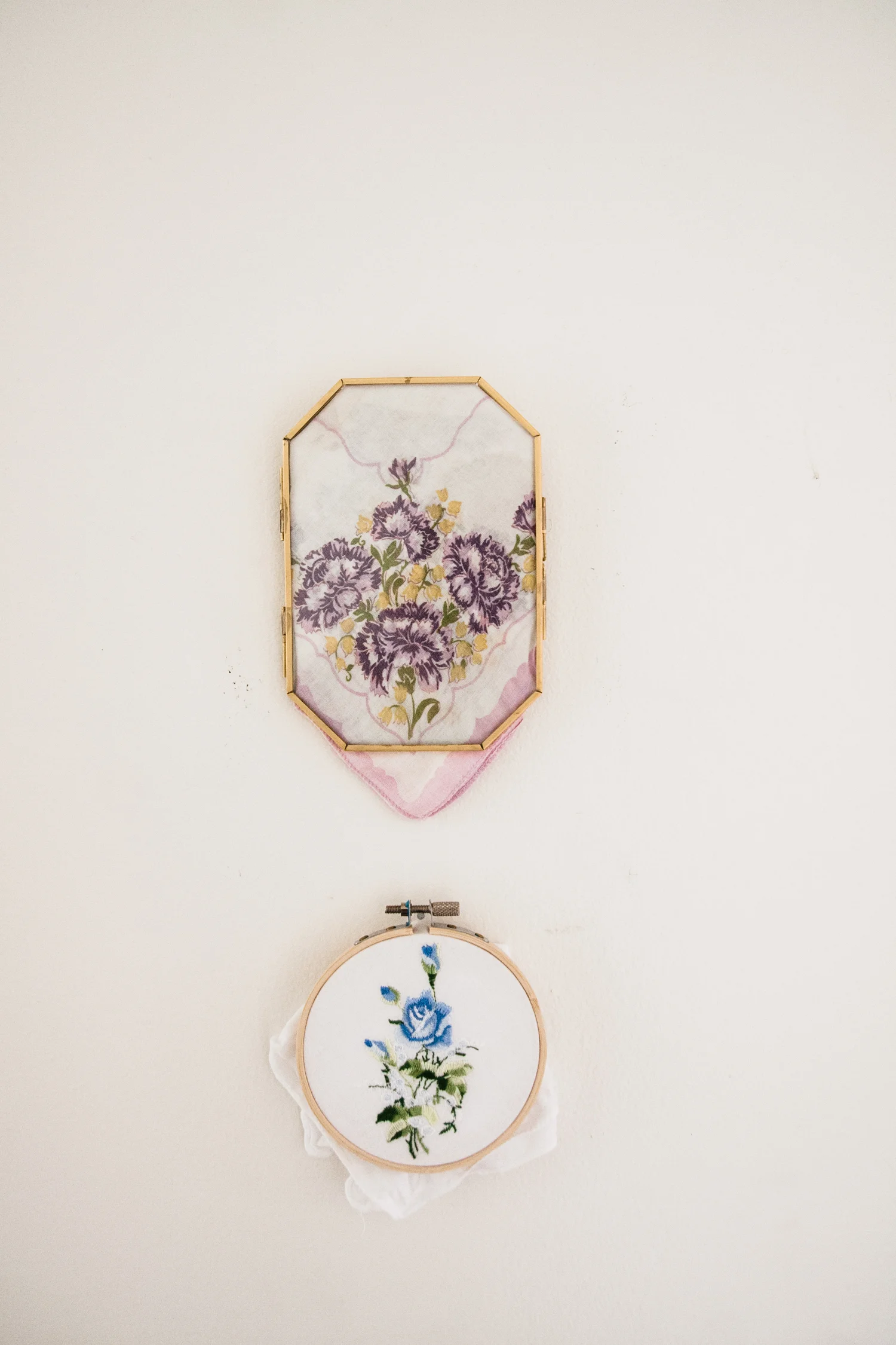 Emily framed her grandmother's handkerchiefs and displays them in her hallway.