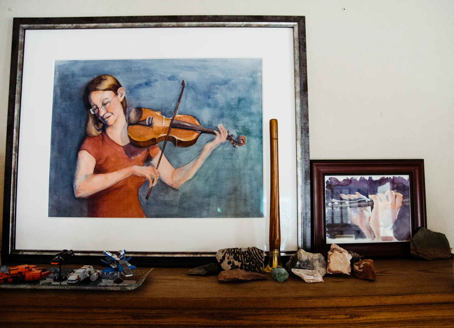 A good friend created these beautiful paintings. We could tell they were special to Angeline and William and suggested displaying them on the mantel where they could see them more often. Artwork by: Margaret Sloan