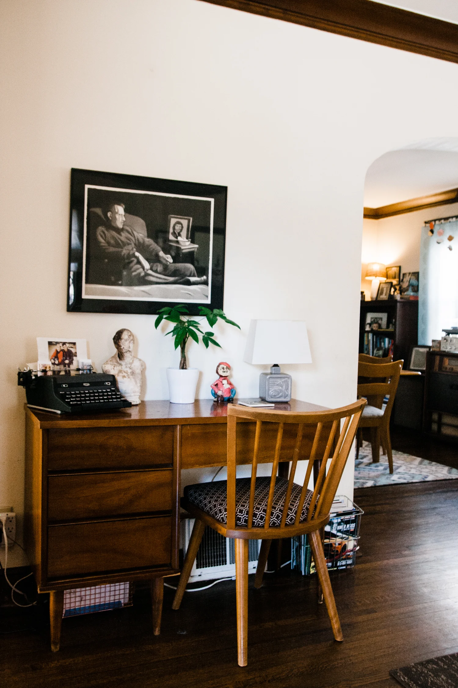 One of Allison's favorite pieces: the monoprint of her grandparents hanging above the desk.