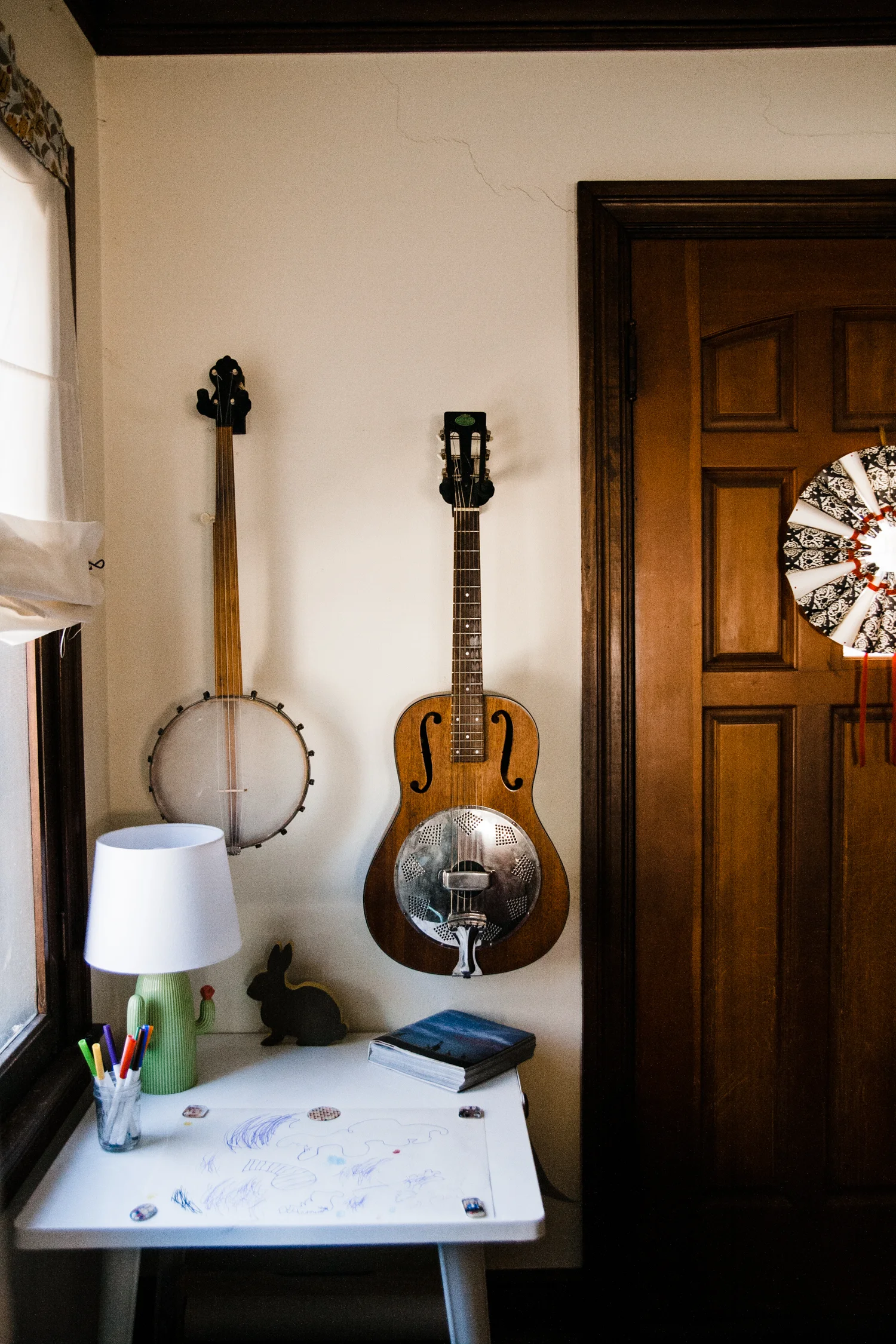 Claudette's art table is tucked away just to the left of the front door.