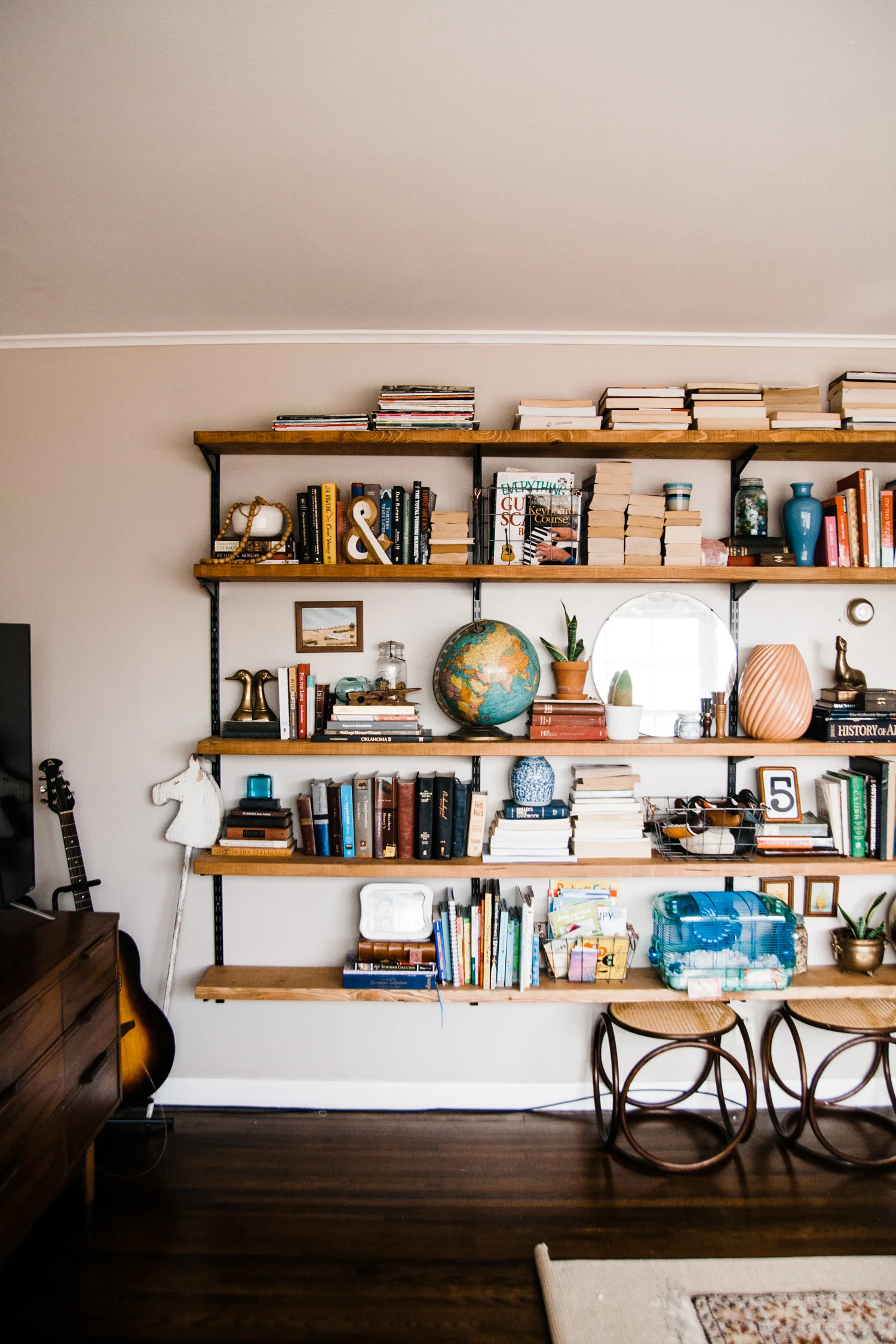 Rachel and her husband installed the open shelving in the living room themselves.