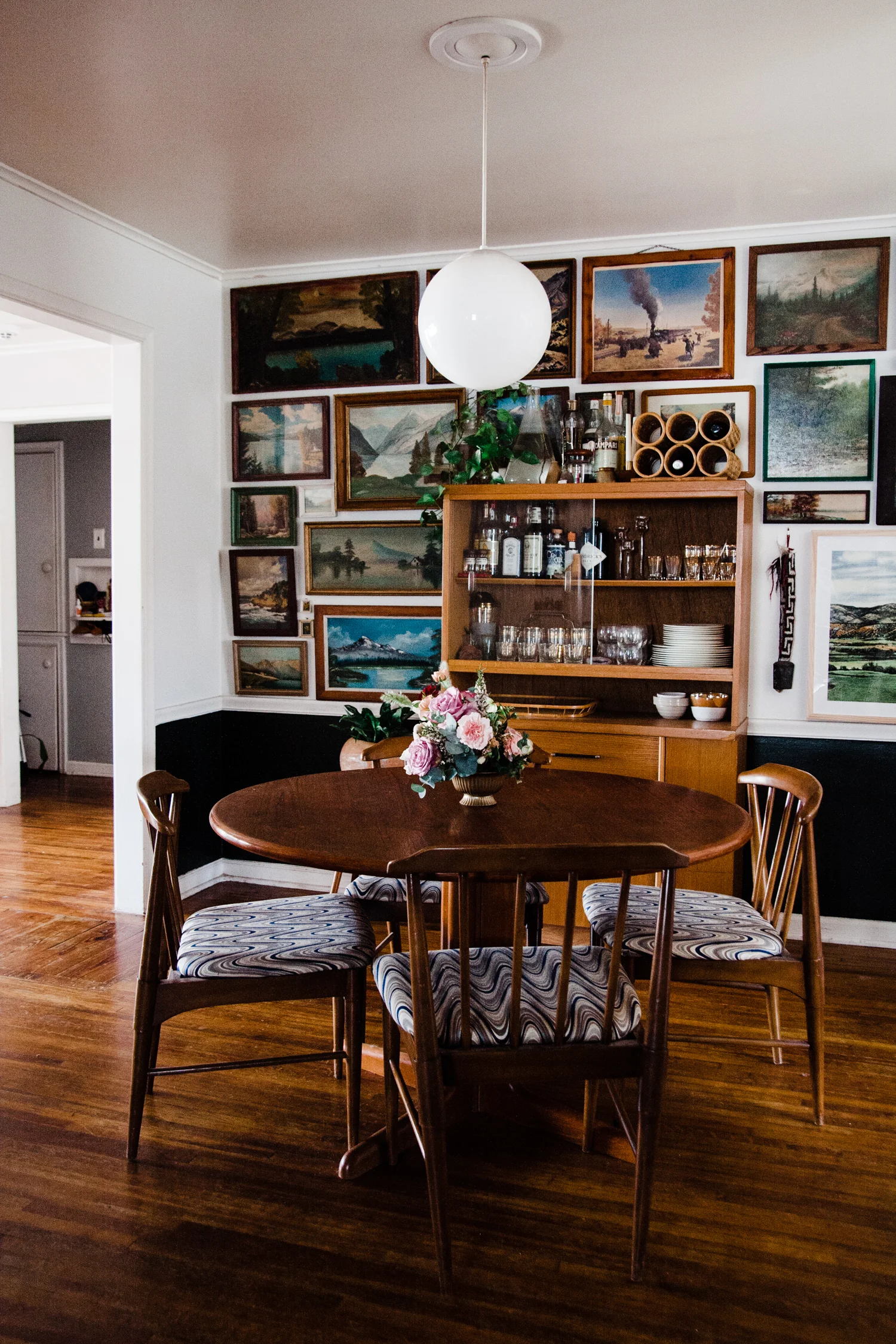 My dining chairs are from Retro Den before Ashley and I owned it. And the dining table is from Mod50s. Wine rack is from a thrift store. China hutch is one we had at the shop for a loooooong time, and the only one we had when I decided I HAD TO HAVE a china hutch RIGHT THEN.