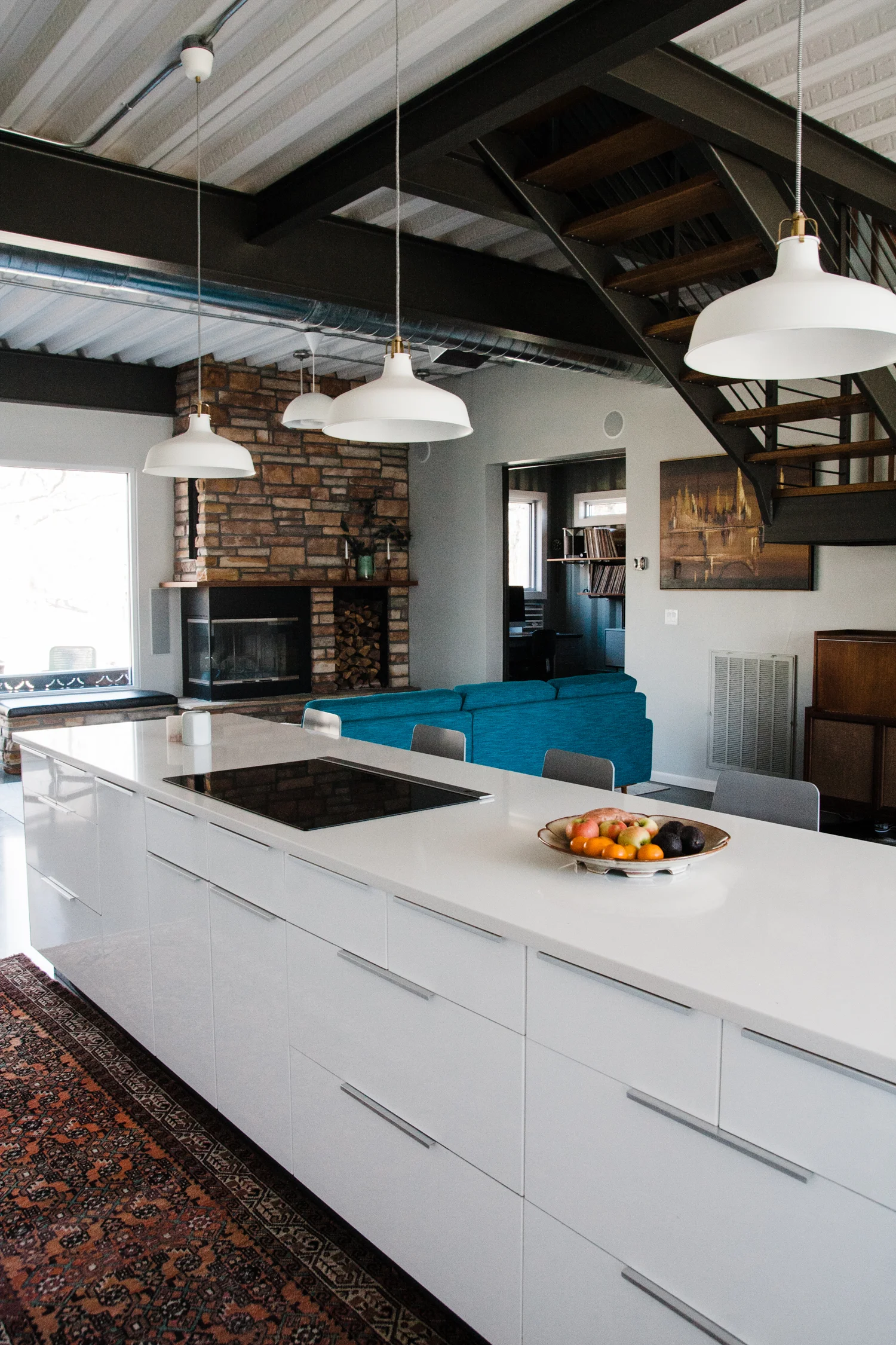The family usually eats breakfast at the vast kitchen island.