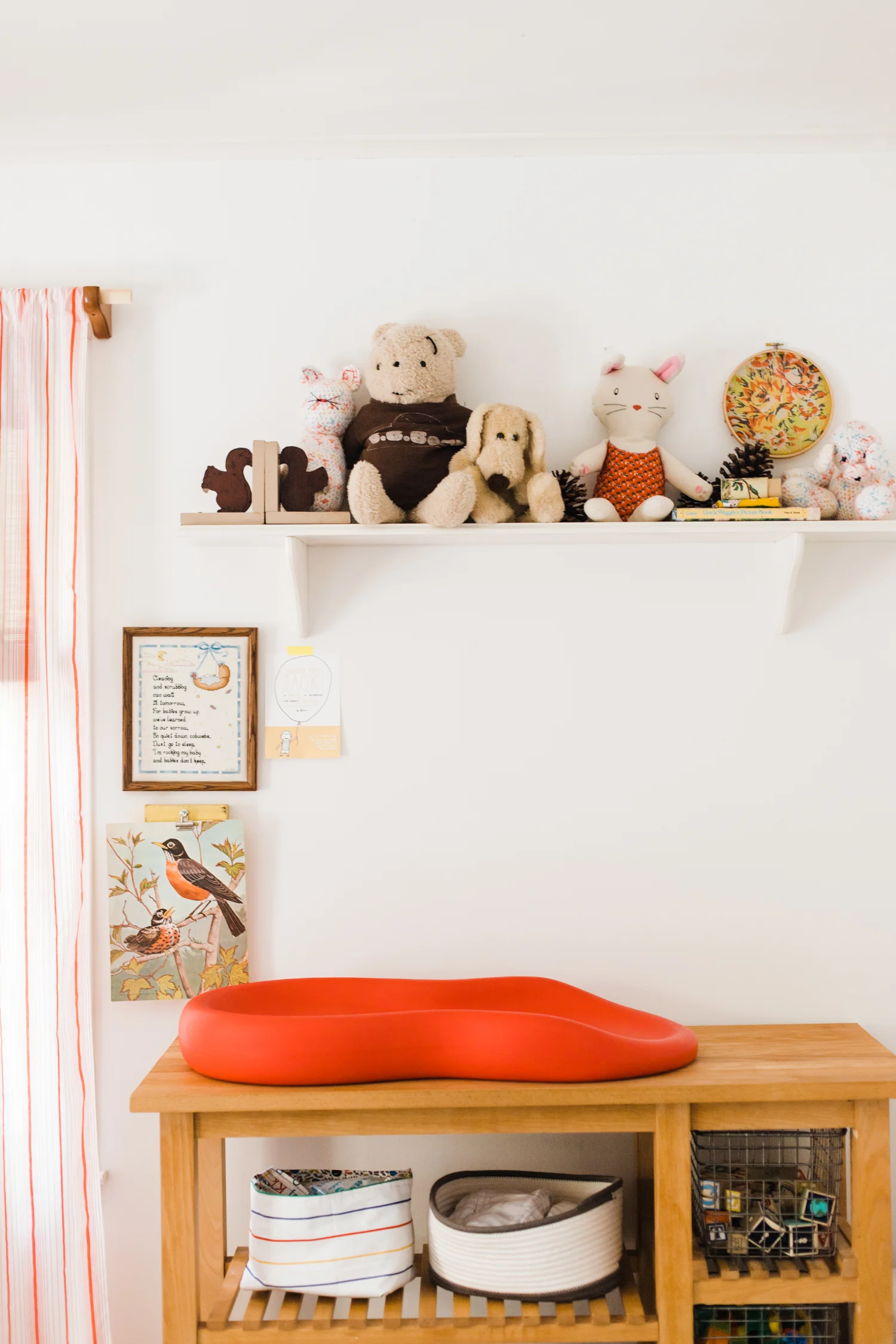 We already had the changing table that my father-in-law built ( He made one for Daly too. Nice guy, my father-in-law.). We had been mostly using it for toy storage since Caroline stopped wearing diapers, but we quickly cleared the top and dedicated a basket or two to diapers instead of dinosaurs and blocks. The toddler and the baby can easily share this piece! PS My friend Briana (founder of the Alliday Show ) made that pretty striped basket on the left!