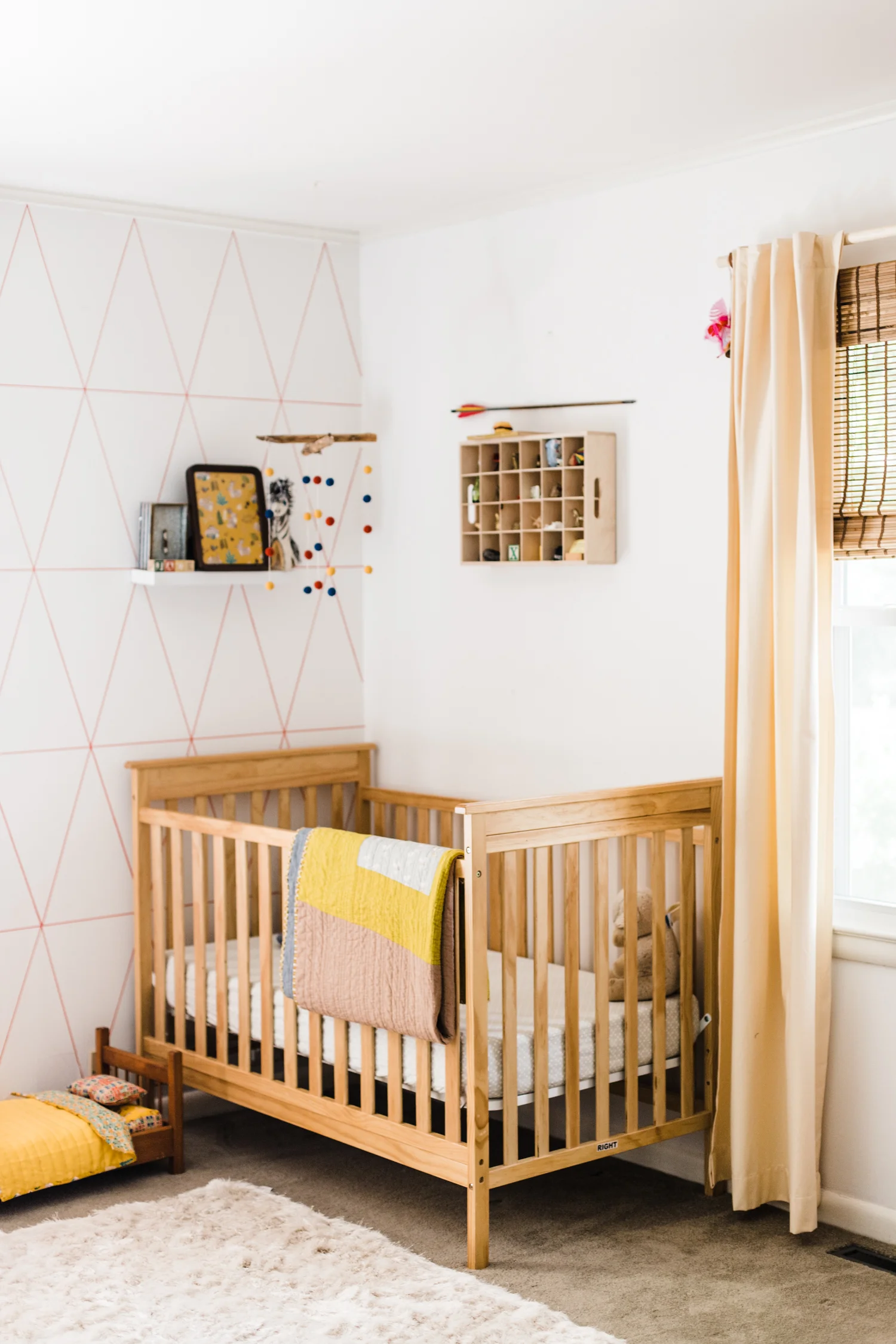 Crib and toddler bed in small room hotsell