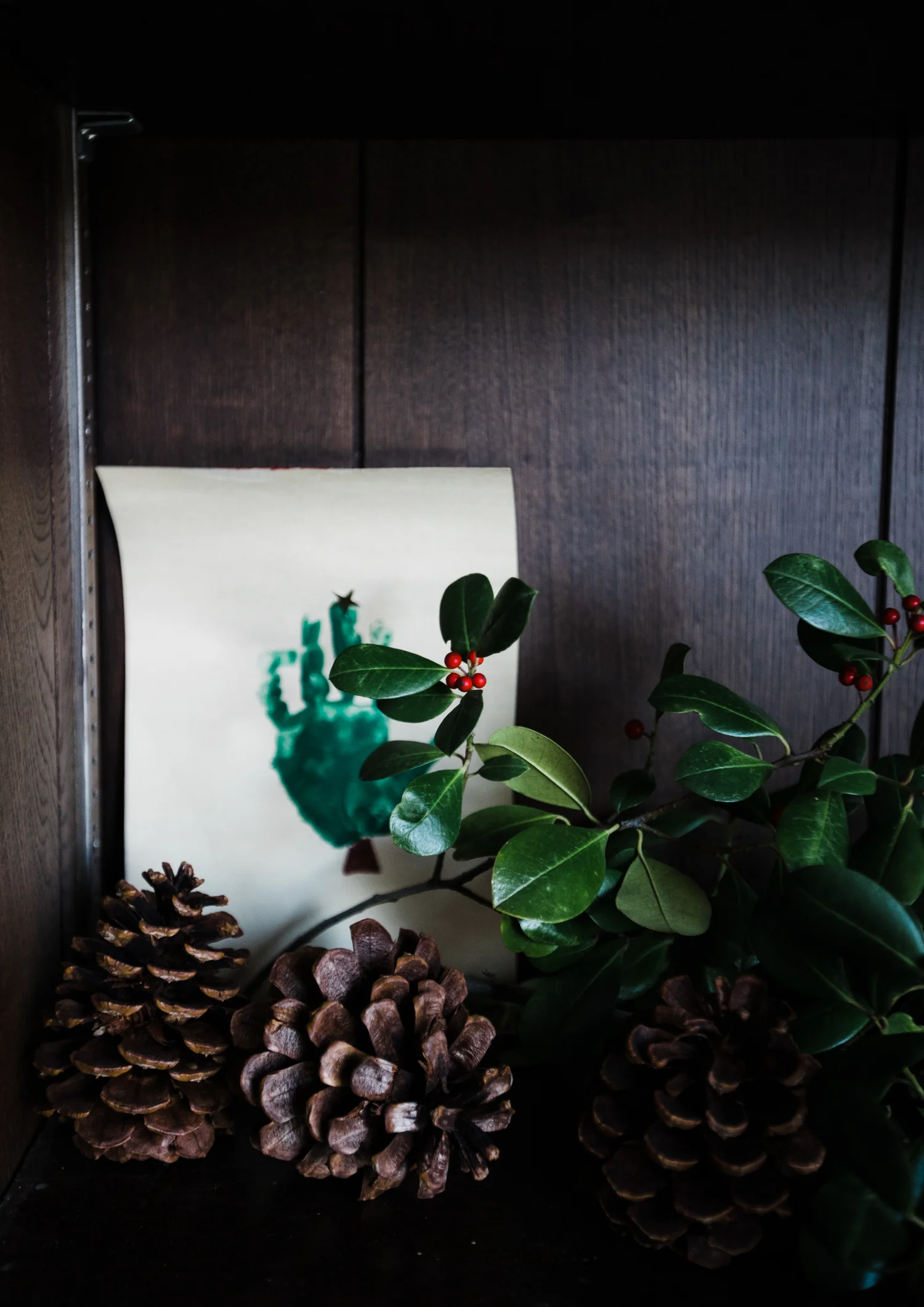 I kept some of Caroline’s holiday art last year and was excited to display a few select pieces like this Christmas tree hand print.