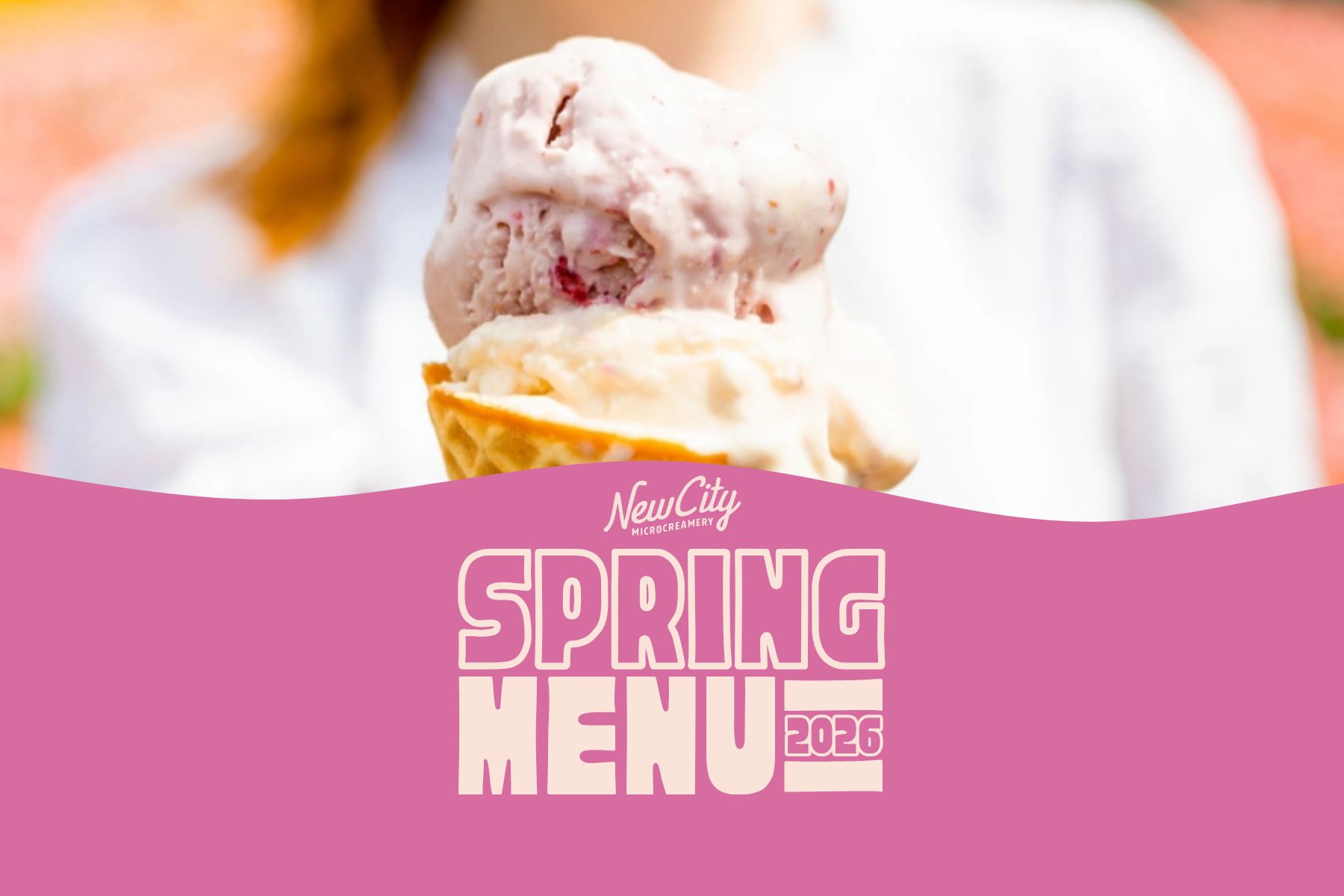Two scoops of ice cream, one strawberry and one vanilla, in a cone, with a pink overlay and text promoting a spring menu for New City Microcreamery, 2026.
