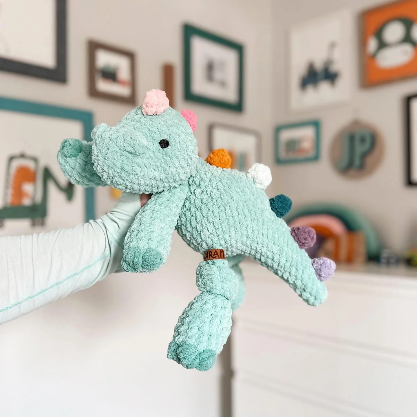 This sweet dino can&rsquo;t wait to find his forever home! So if you&rsquo;re looking for a snuggly new friend, you can find him in my shop! 🩵

Pattern: @mamamademinis 
Yarn: @bernatyarn 

#crochetplushie #handmadeforkids #letthemplay #handmadenurse