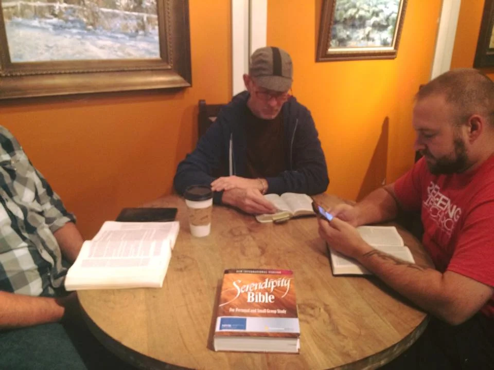 Jay, Ed, and Derek, using the Serendipity Bible to discuss Nehemiah at a local coffeehouse. 