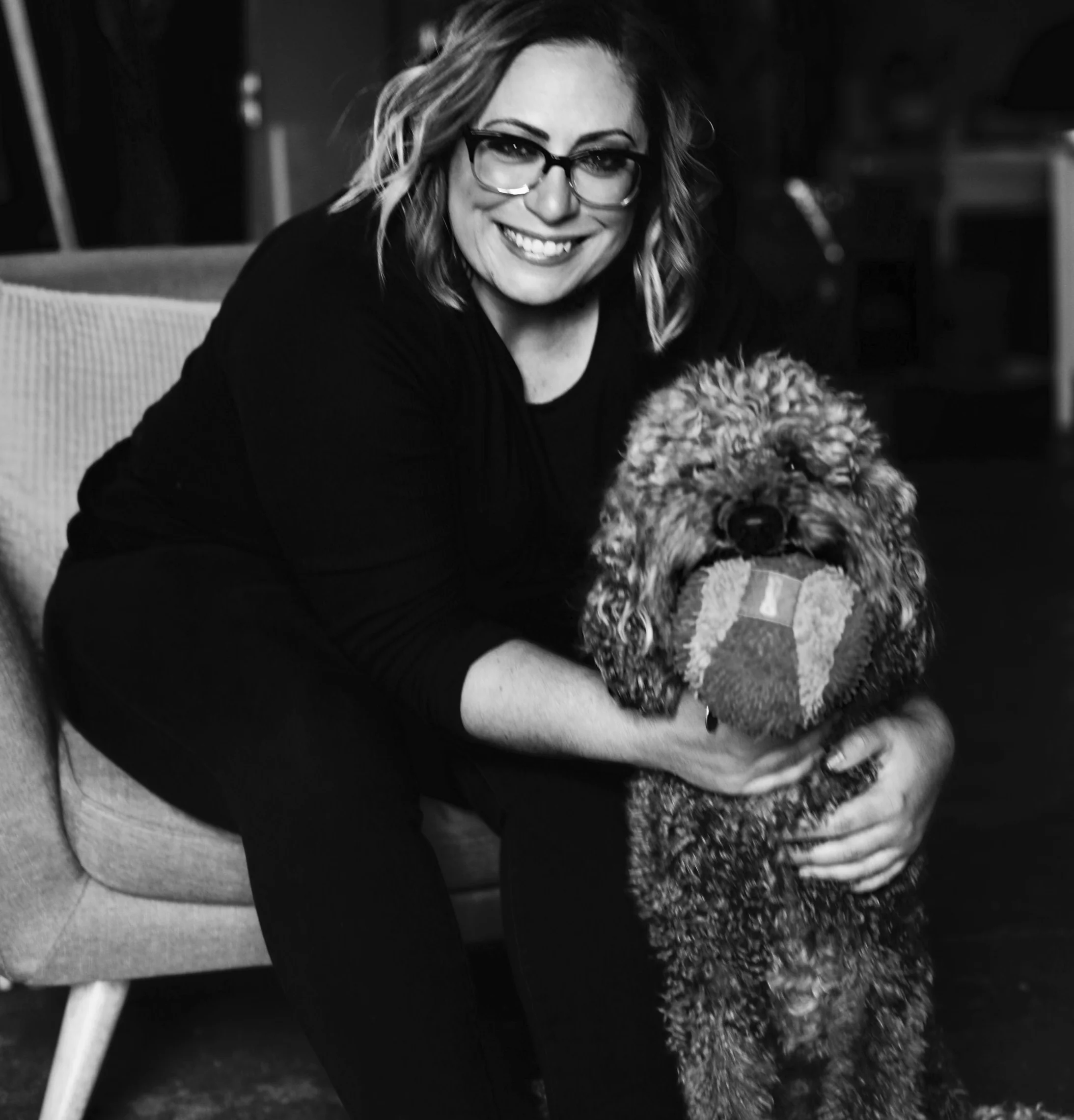 Laura and her labradoodle/muppet, Violet.