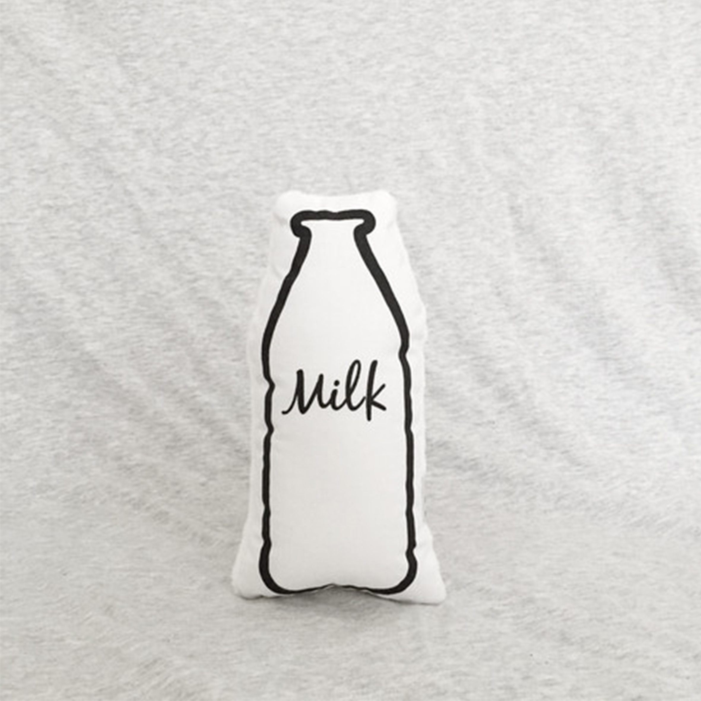 Milk rattle by The Milk Collective