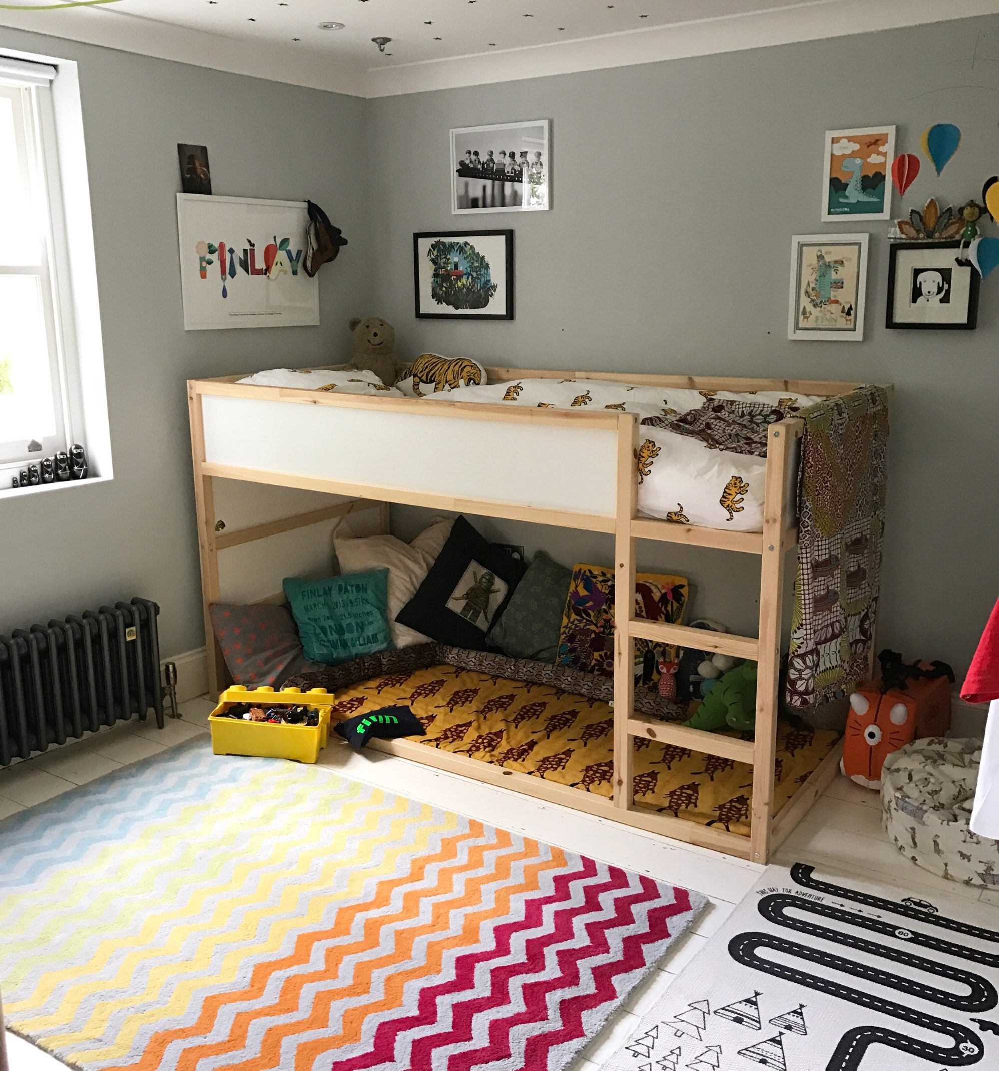 bunk bed with cot underneath