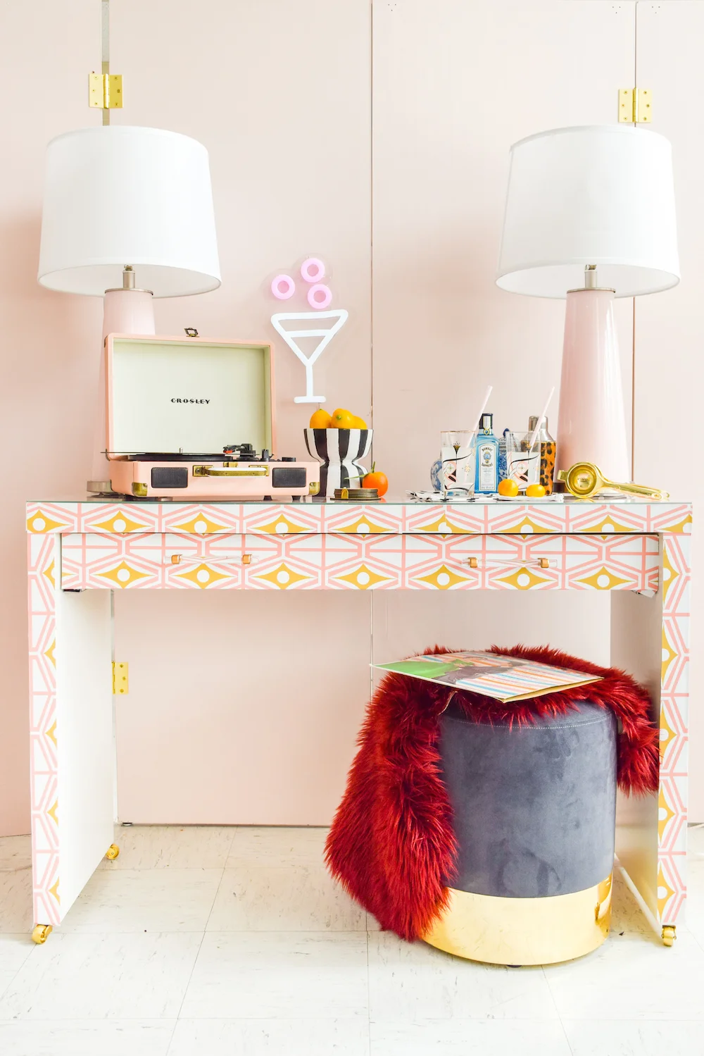 How amazing is this repurposed table using wallpaper? Metro - Midcentury Modern Retro Geometric Fusion Pink & Gold print by Heather Dutton . Maker credit: PMQ for Two